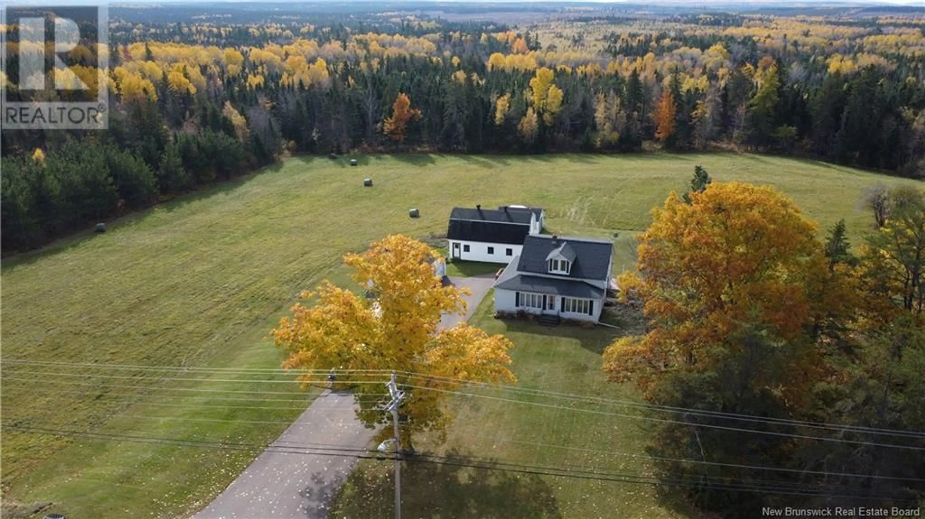 A pic from outside/outdoor area/front of a property/back of a property/a pic from drone, unknown for 83 Pollett River Road, Petitcodiac New Brunswick E4Z4J4