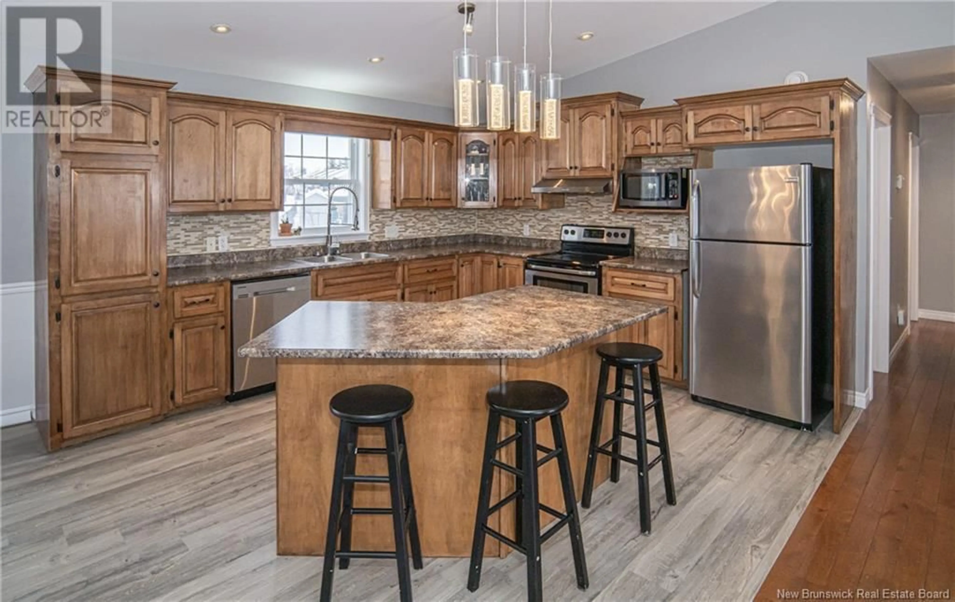 Open concept kitchen, unknown for 102 Watling Crescent, Oromocto New Brunswick E2V4M8