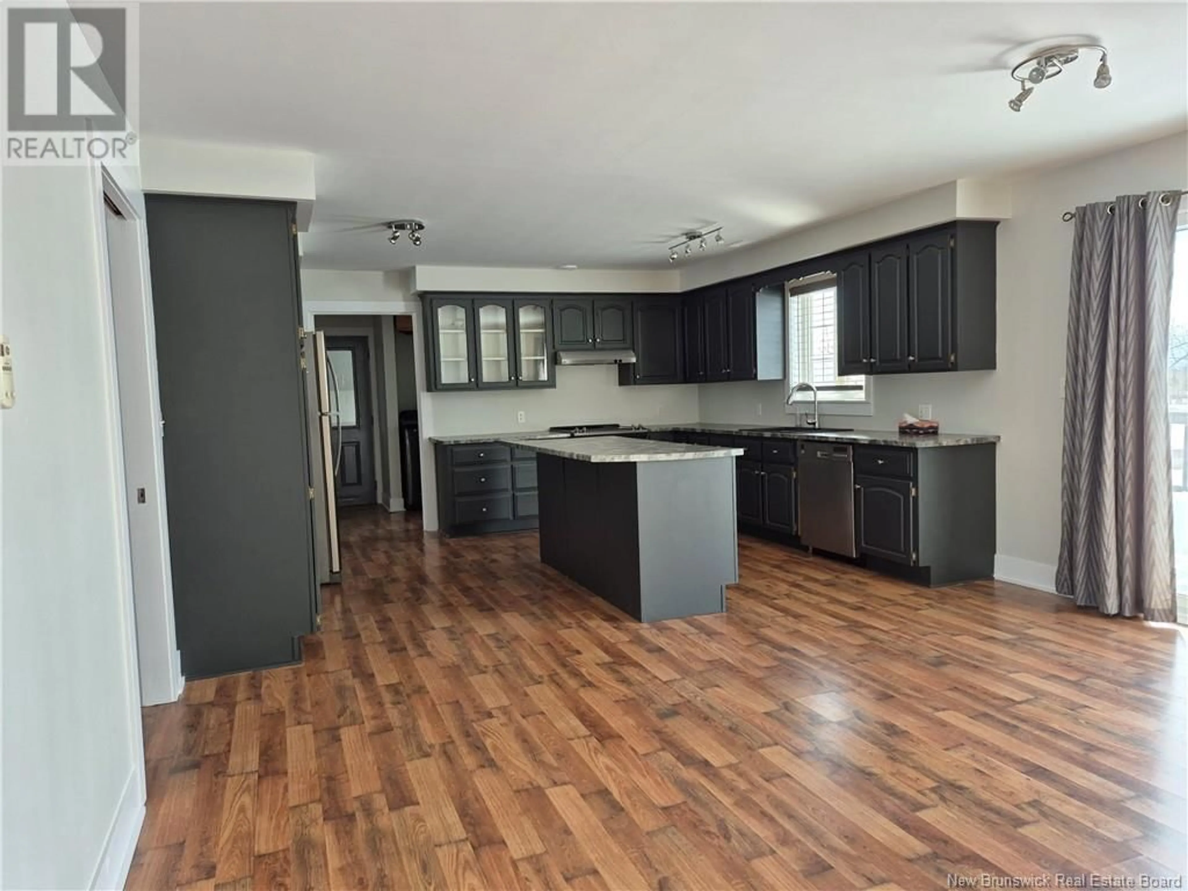 Open concept kitchen, wood/laminate floor for 545 616 Rte, Keswick Ridge New Brunswick E6L1S4