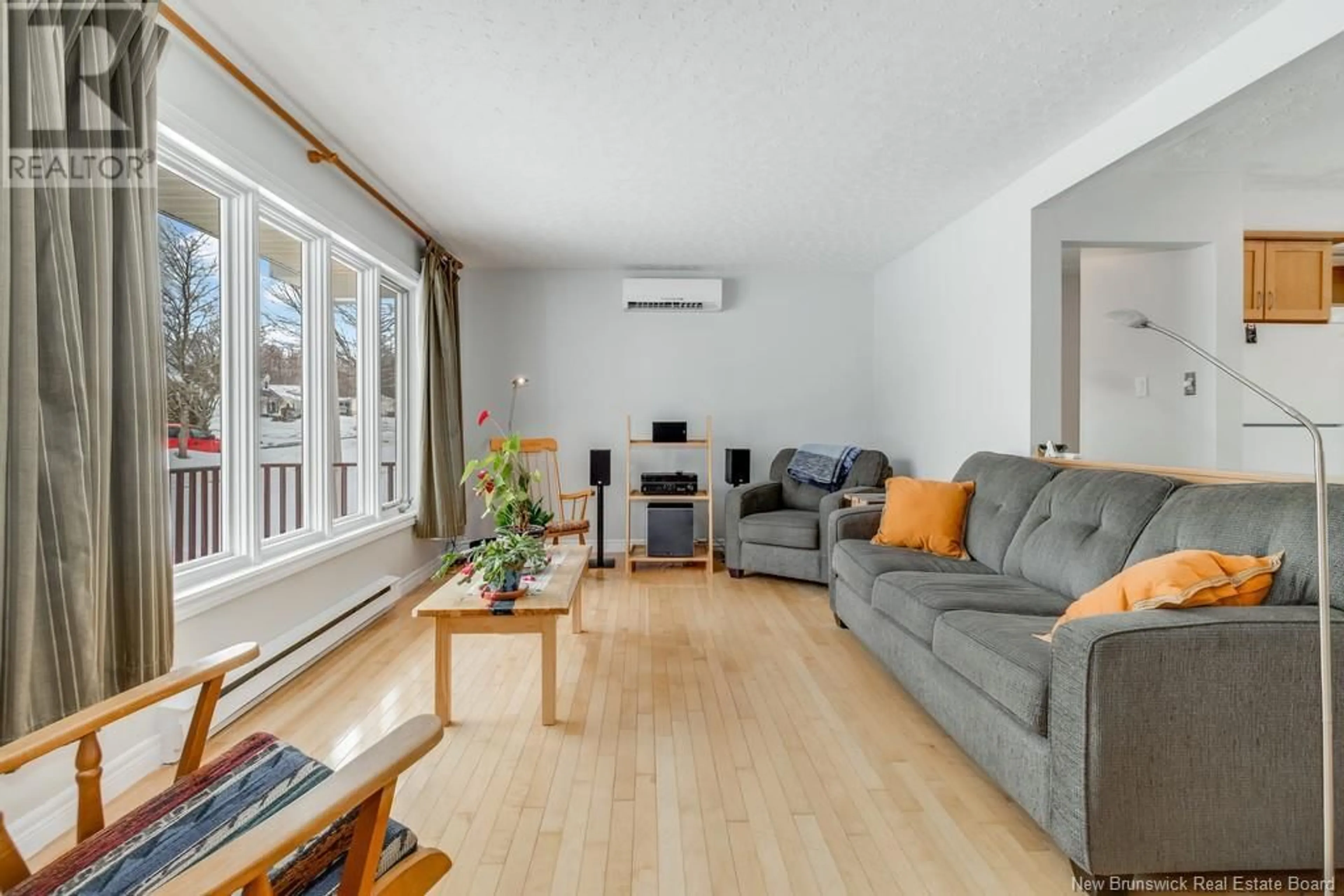 Living room with furniture, wood/laminate floor for 164 Adams Street, Fredericton New Brunswick E3B7G3