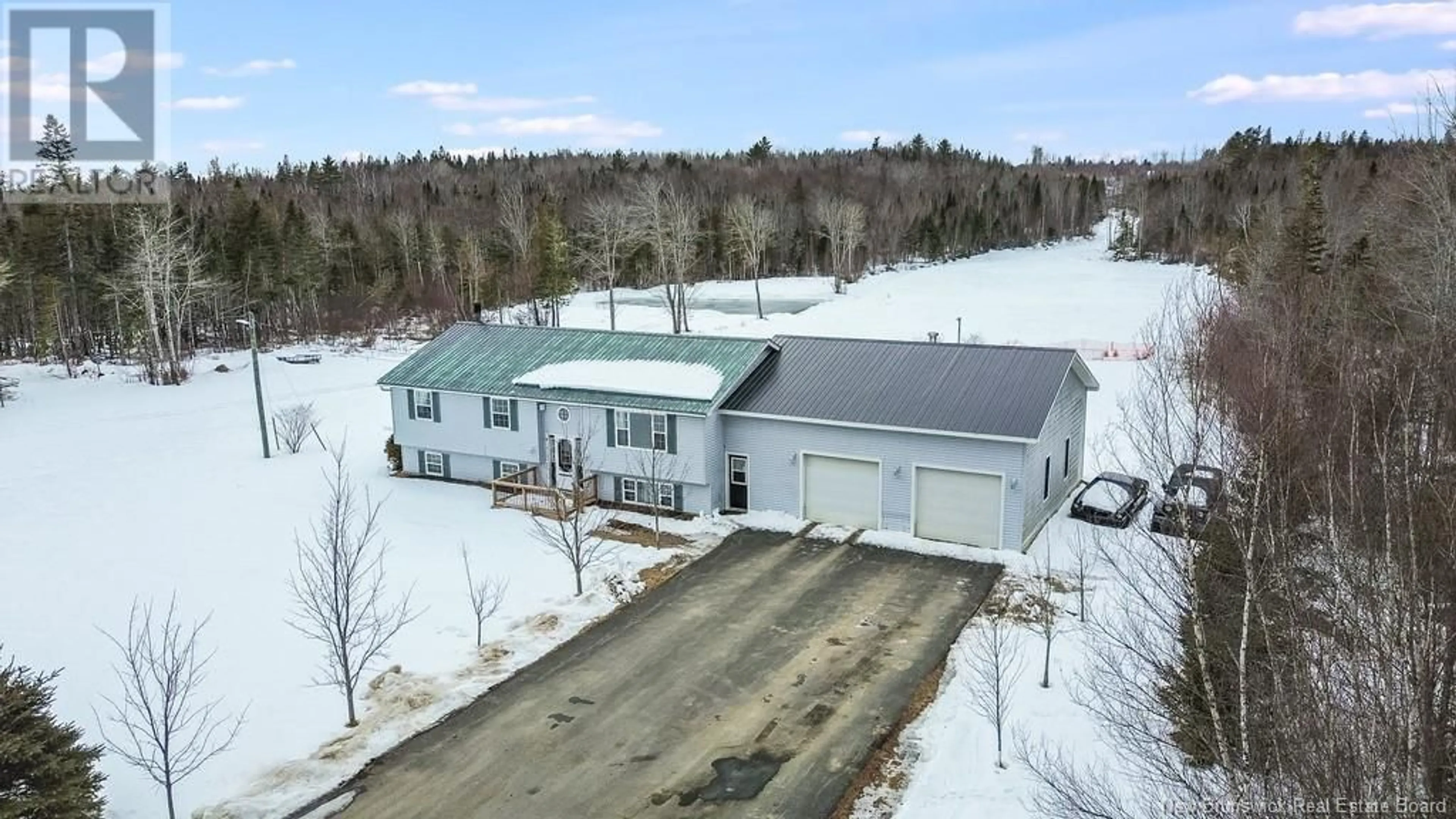 A pic from outside/outdoor area/front of a property/back of a property/a pic from drone, building for 8 Nicholas Drive, Old Ridge New Brunswick E3L4Y6