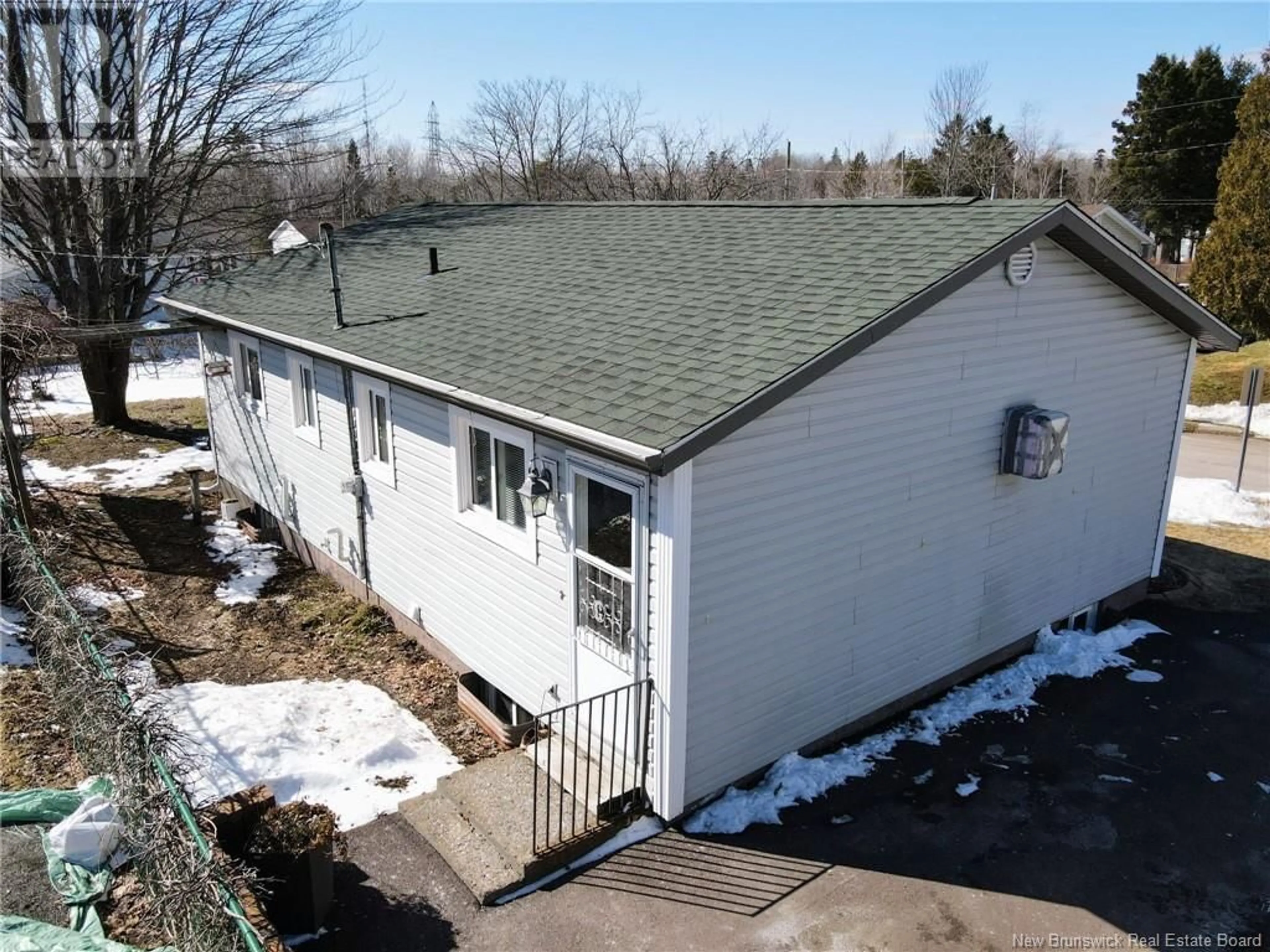 A pic from outside/outdoor area/front of a property/back of a property/a pic from drone, building for 15 Wildwood Court, Moncton New Brunswick E1E2M4