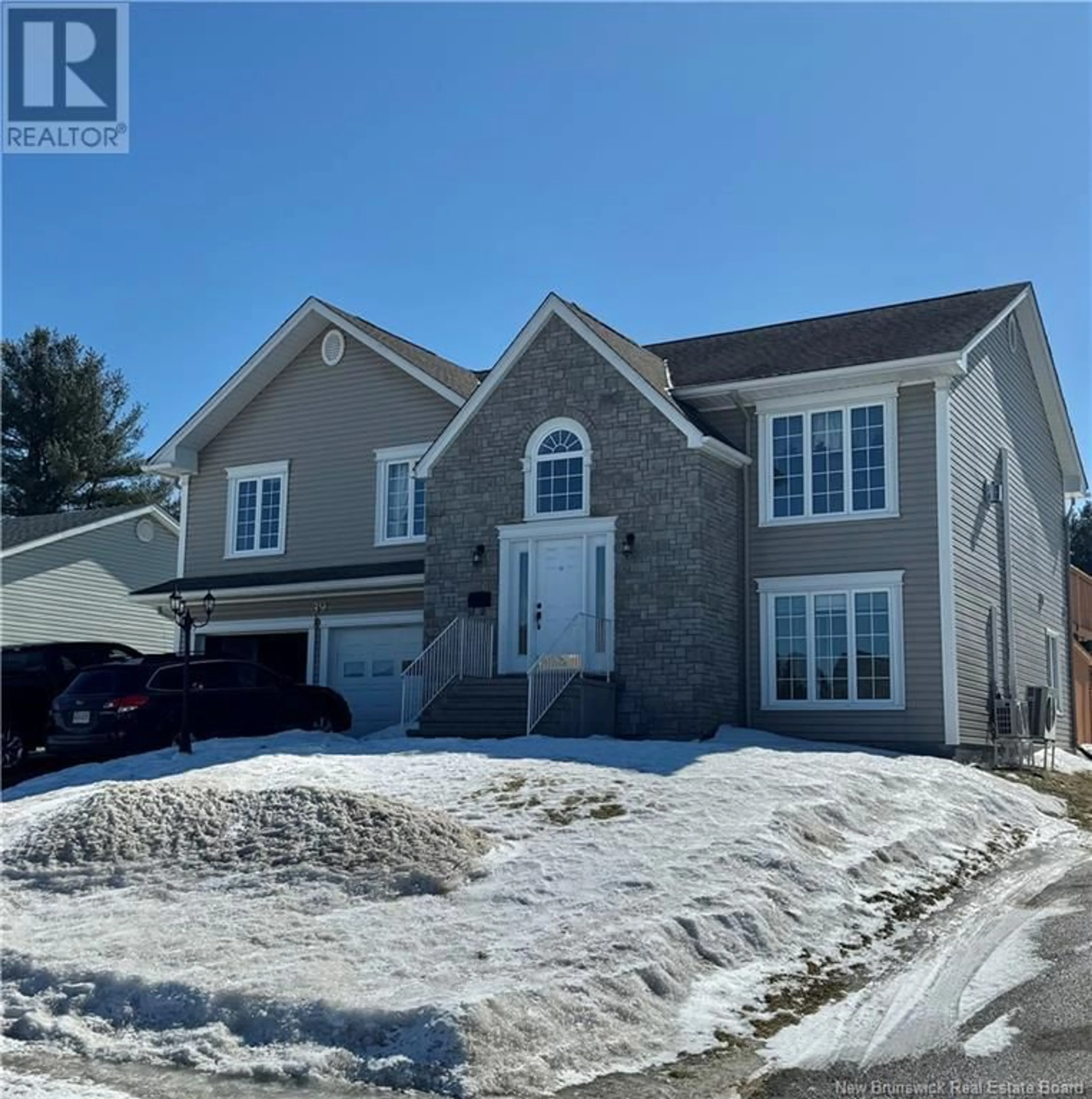 Home with brick exterior material, street for 39 Chatham Avenue, Oromocto New Brunswick E2V4N7