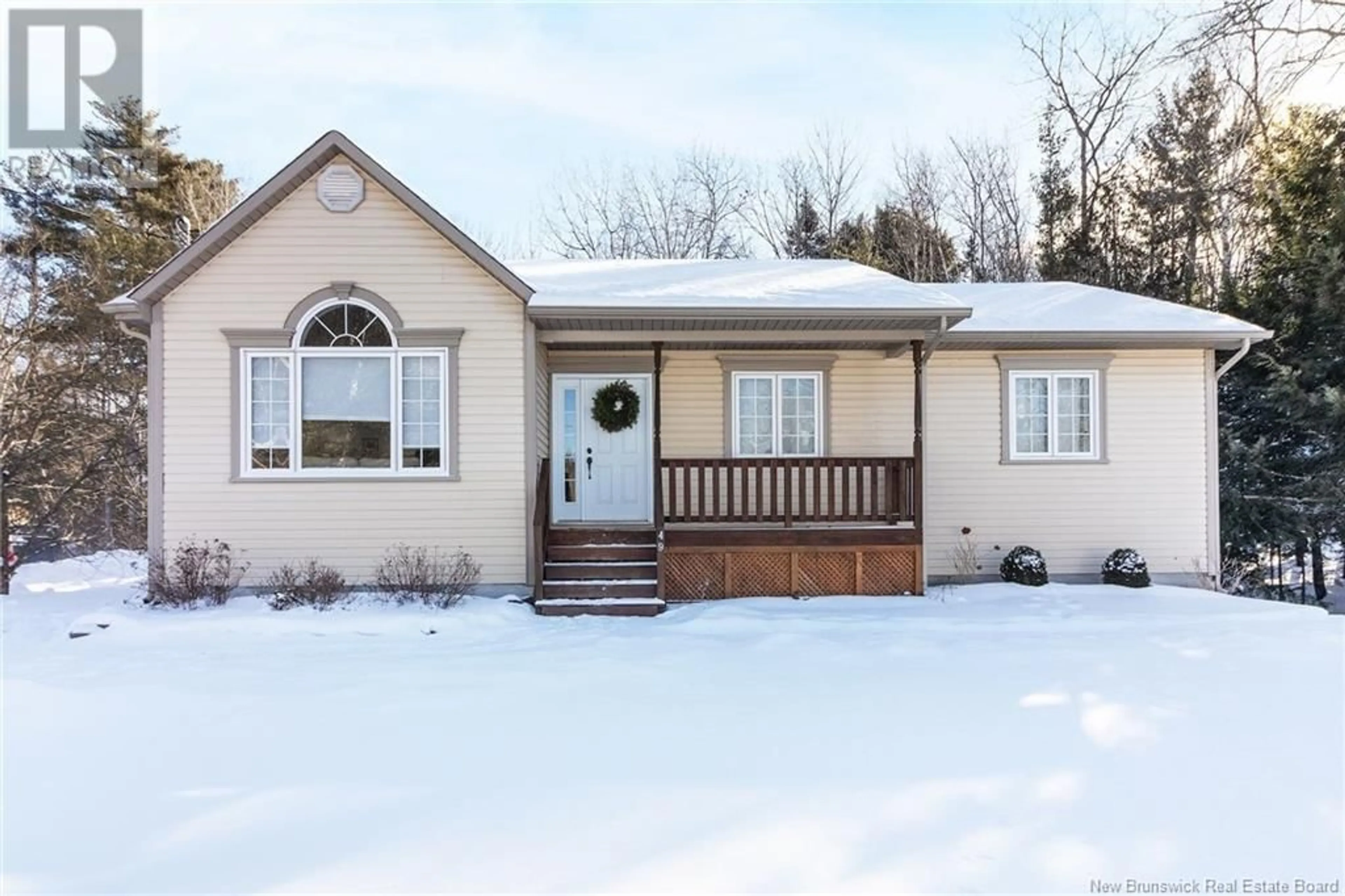 Home with vinyl exterior material, street for 49 Dewitt Acres, Fredericton New Brunswick E3A6S3