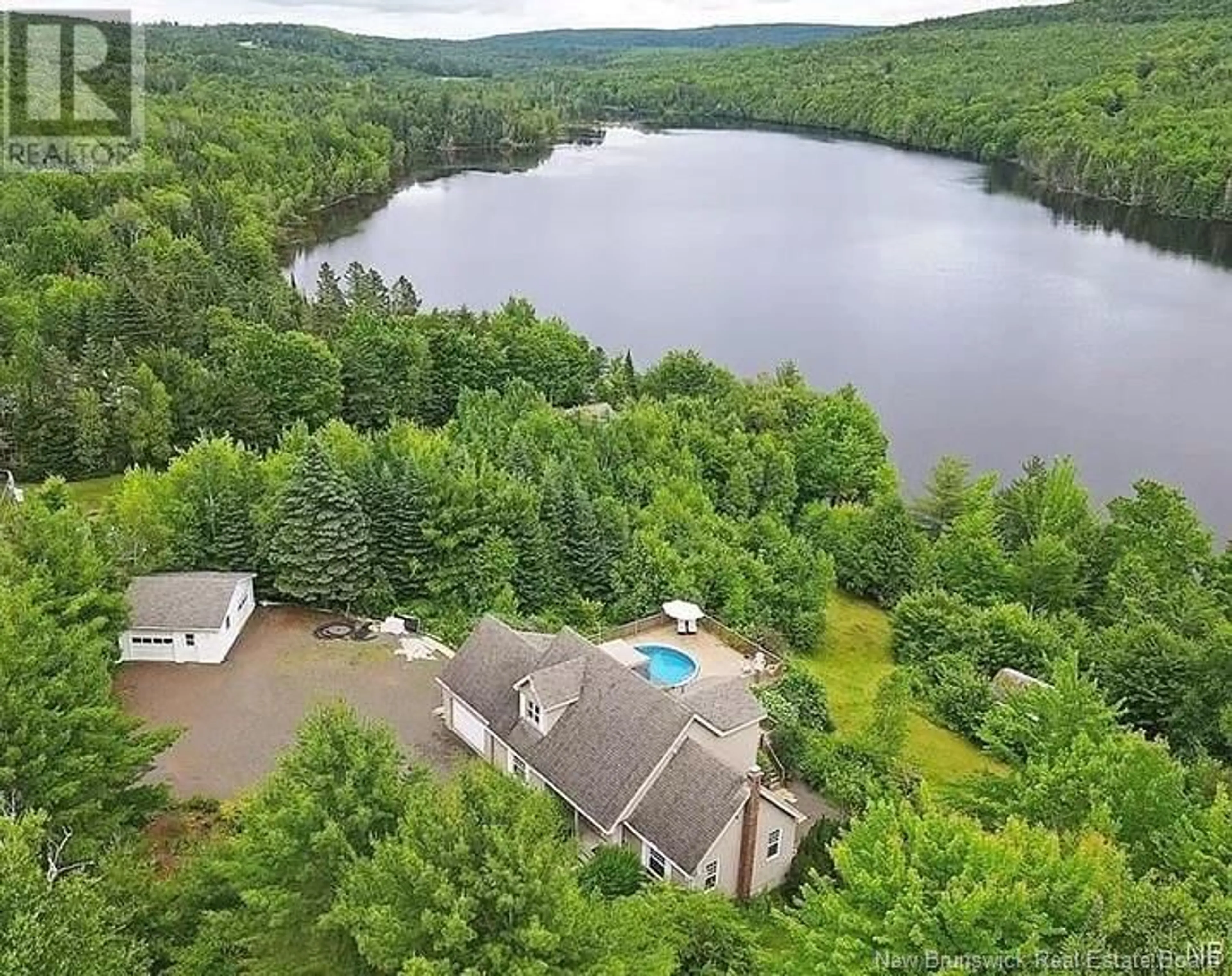 A pic from outside/outdoor area/front of a property/back of a property/a pic from drone, water/lake/river/ocean view for 18 Hillview Street, Upper Kingsclear New Brunswick E3E1V1