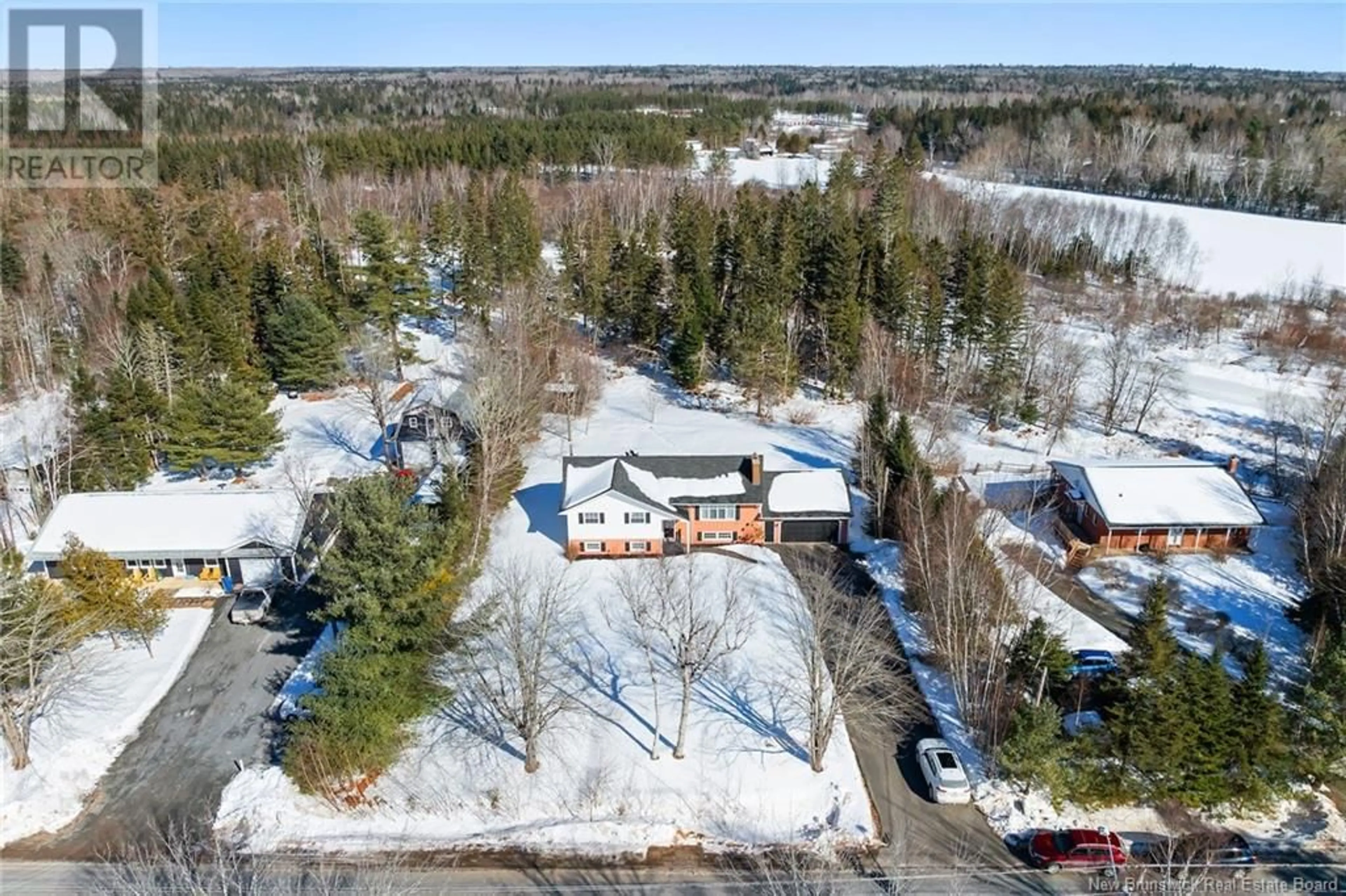 A pic from outside/outdoor area/front of a property/back of a property/a pic from drone, street for 450 Bryson Road, Nasonworth New Brunswick E3B8E9