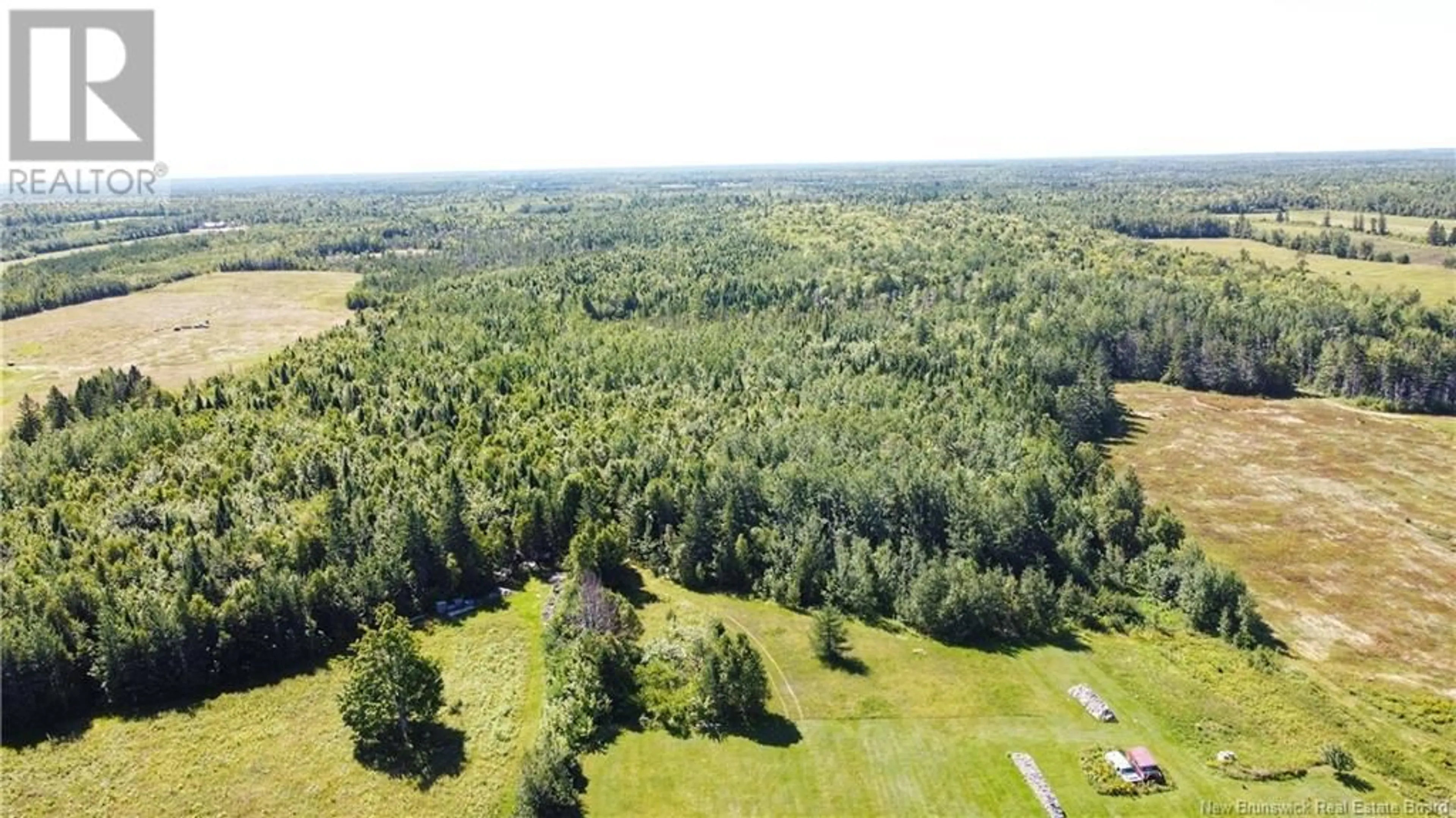 A pic from outside/outdoor area/front of a property/back of a property/a pic from drone, forest/trees view for 1738 Route 355, Sainte-Rose New Brunswick E1X2X3