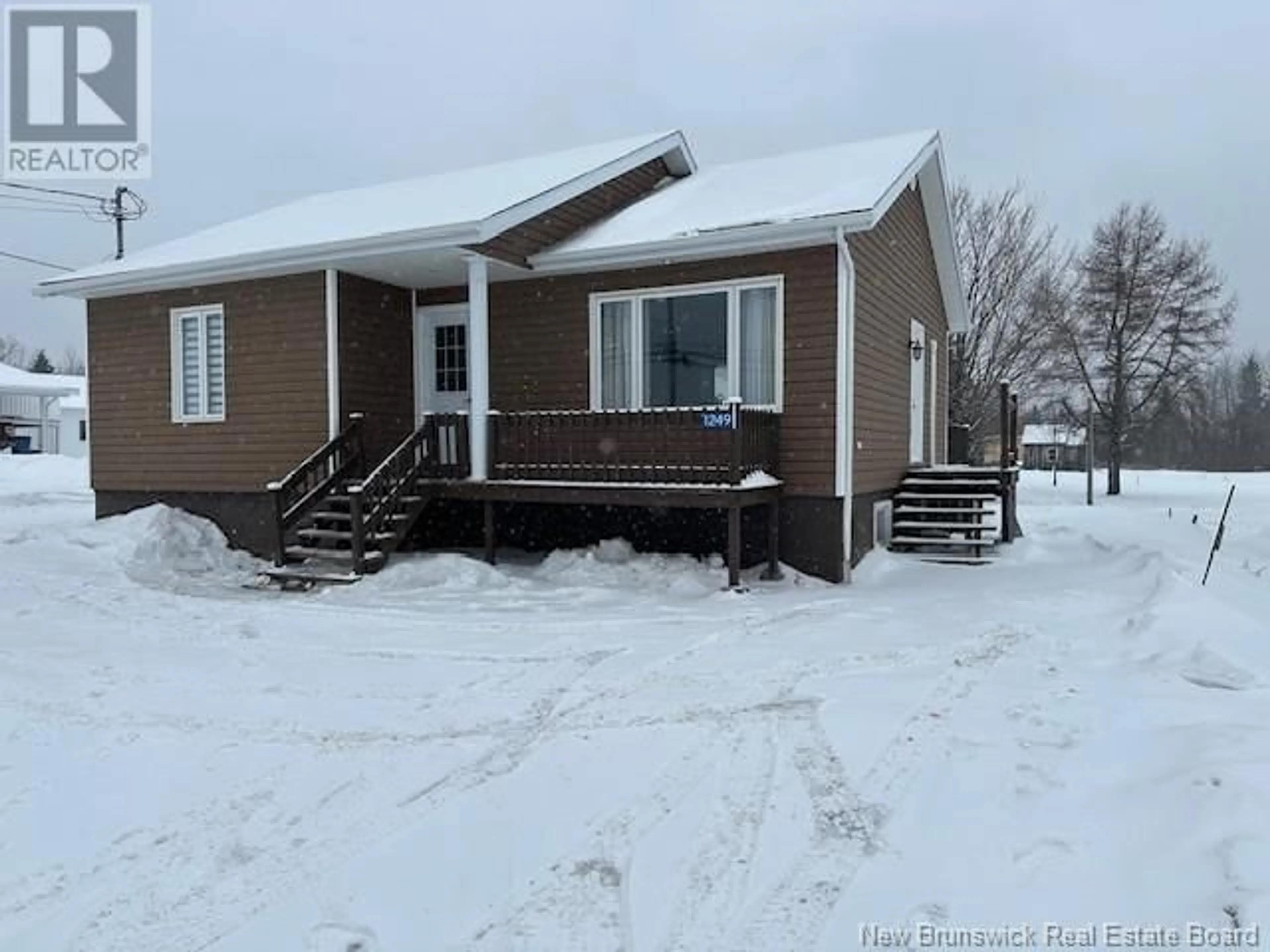 A pic from outside/outdoor area/front of a property/back of a property/a pic from drone, building for 1249 Des Pionniers Avenue, Balmoral New Brunswick E8E1B7