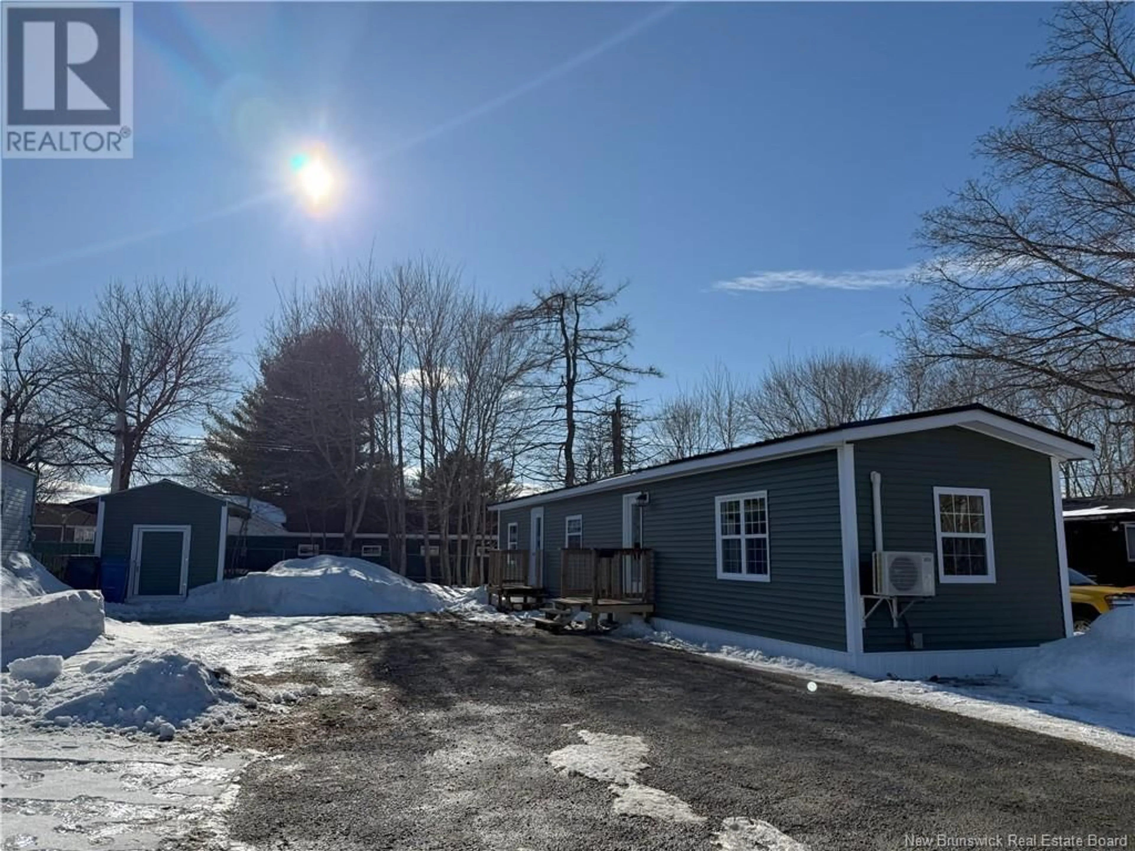 A pic from outside/outdoor area/front of a property/back of a property/a pic from drone, unknown for 34 BRADD STREET, Miramichi New Brunswick E1N1B5