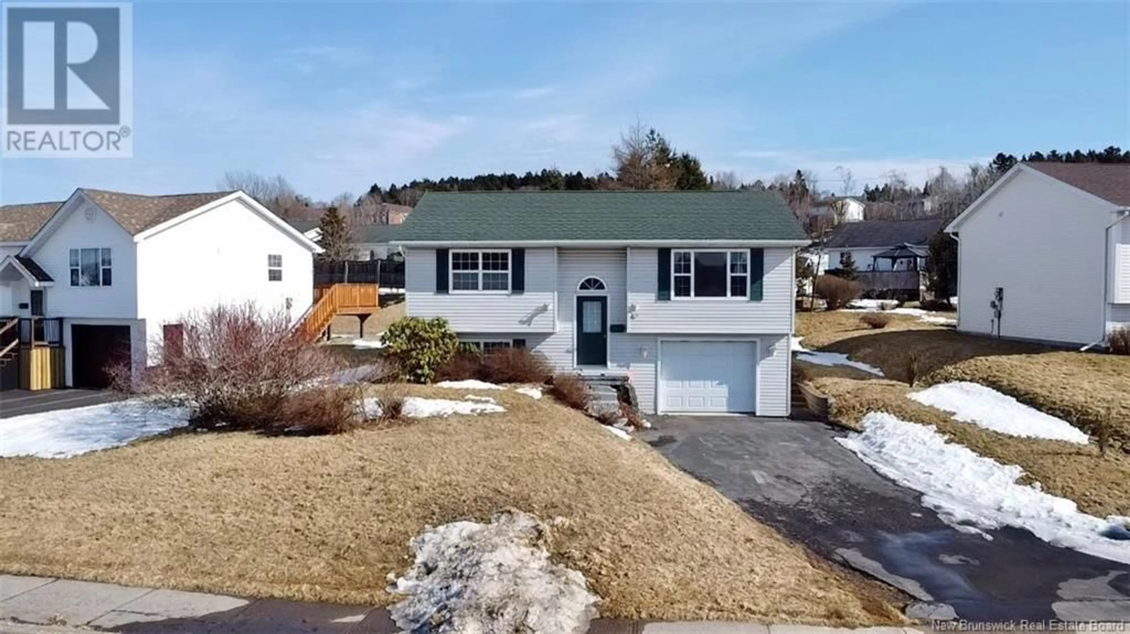 Home with vinyl exterior material, street for 98 Honeysuckle Drive, Saint John New Brunswick E2M5T1