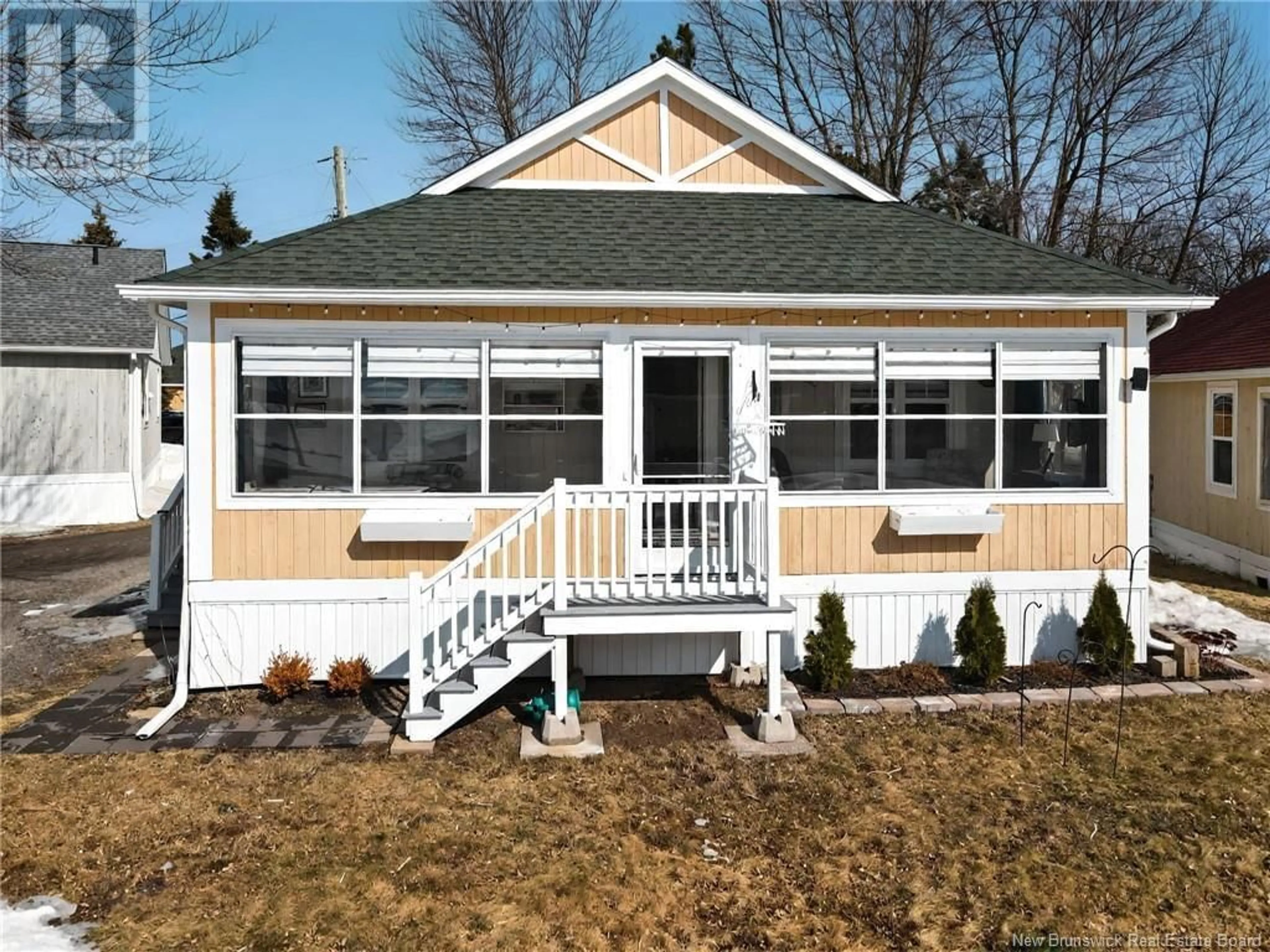 Home with vinyl exterior material, street for 19 - 23 ACADIE, Bouctouche New Brunswick E4S0G3