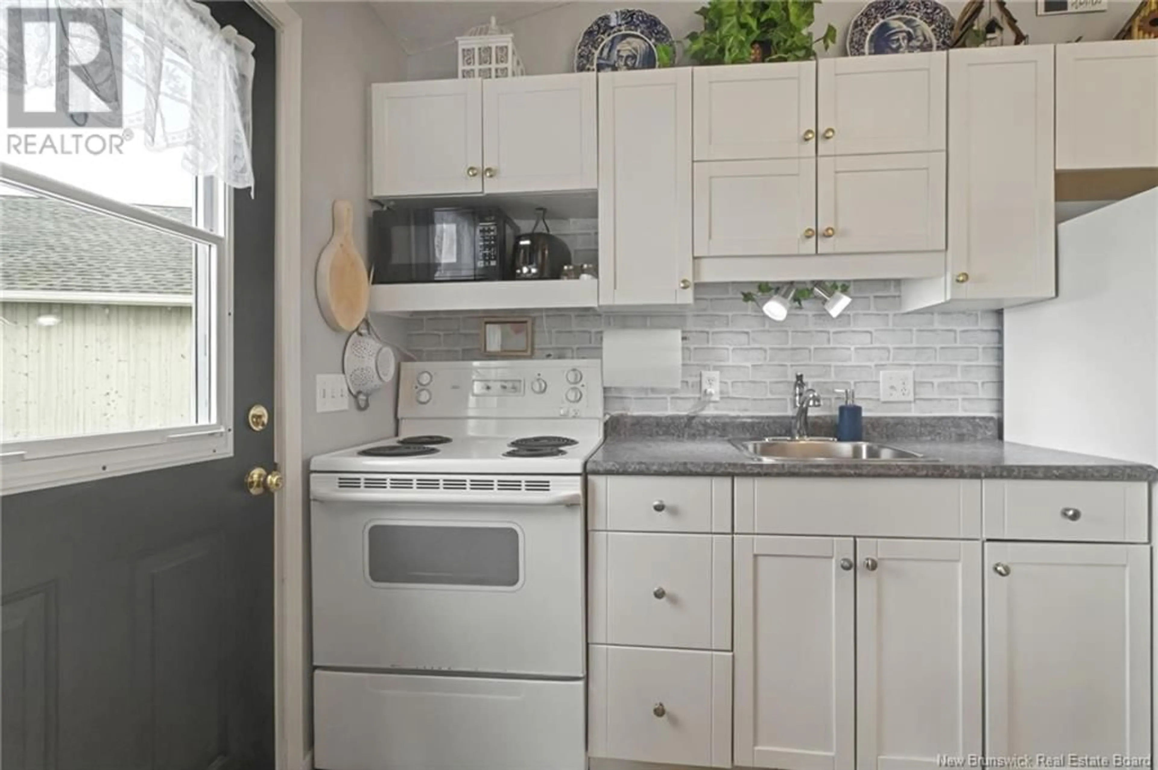 Standard kitchen, ceramic/tile floor for 19 - 23 ACADIE, Bouctouche New Brunswick E4S0G3