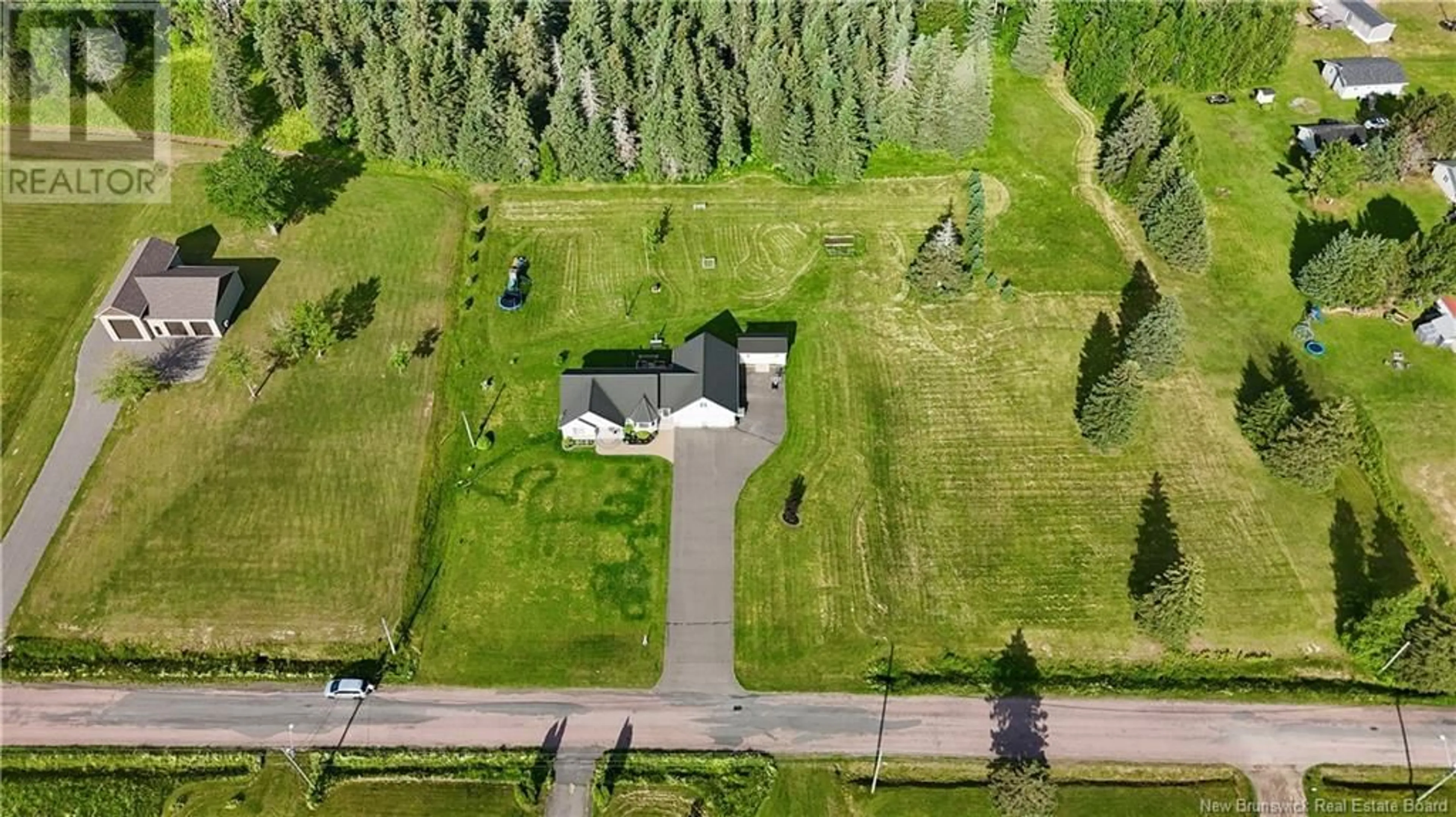A pic from outside/outdoor area/front of a property/back of a property/a pic from drone, street for 32 FALCONER, Notre-Dame New Brunswick E4V1Y5