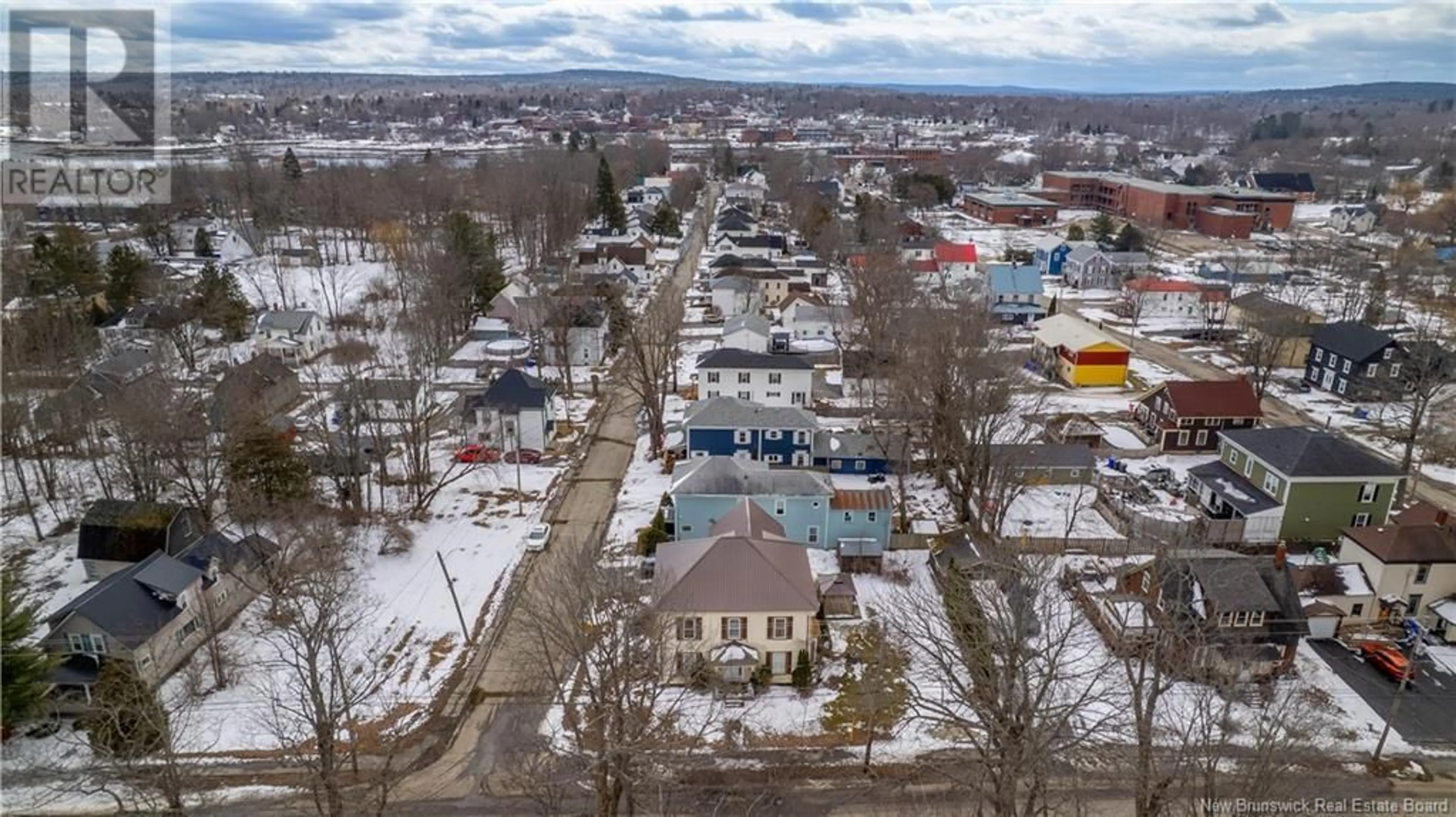 A pic from outside/outdoor area/front of a property/back of a property/a pic from drone, street for 22 Queen W Street, St. Stephen New Brunswick E3L2J9