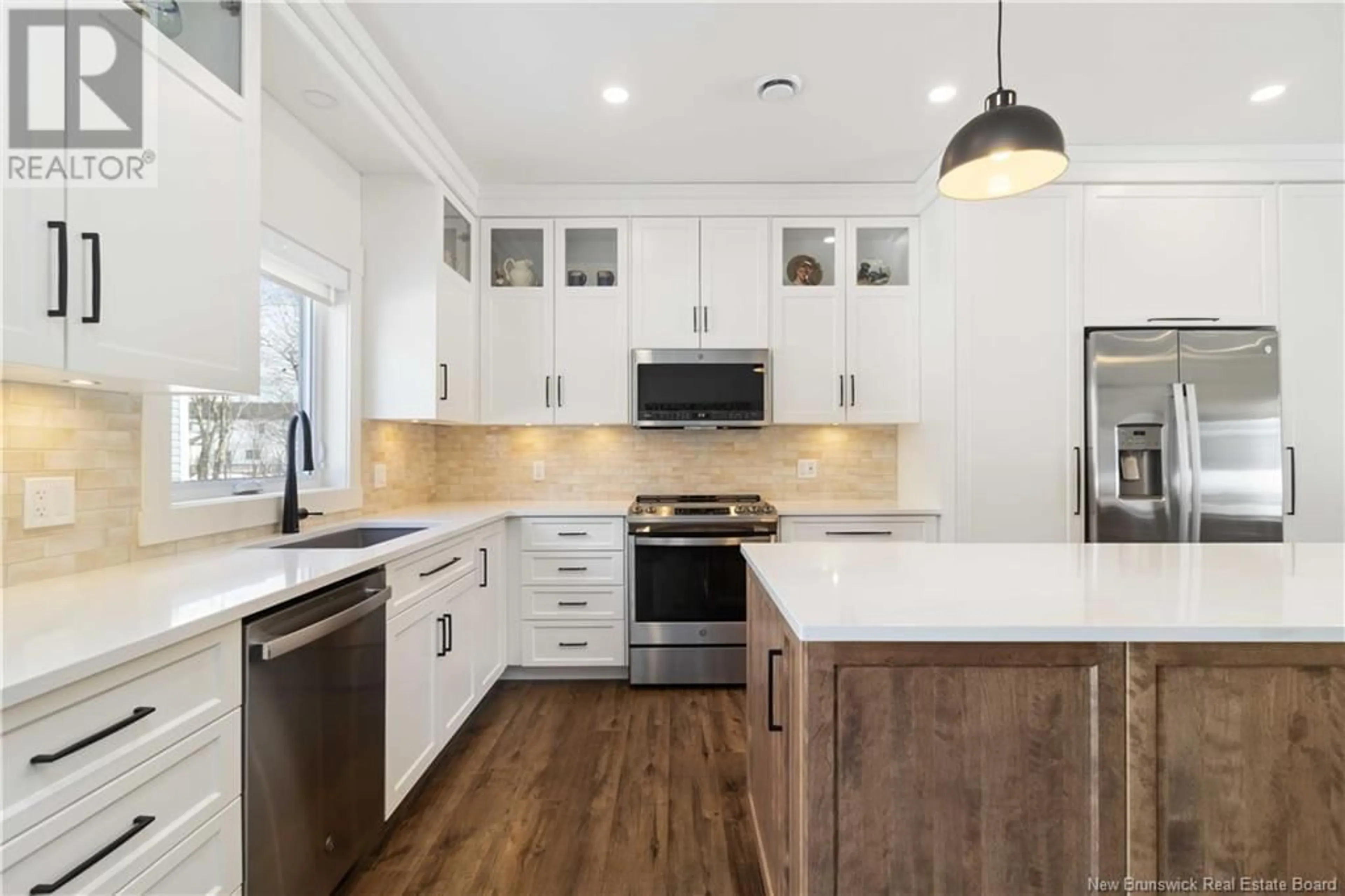 Open concept kitchen, wood/laminate floor for 23 Boxwood Lane, New Maryland New Brunswick E3C0R7