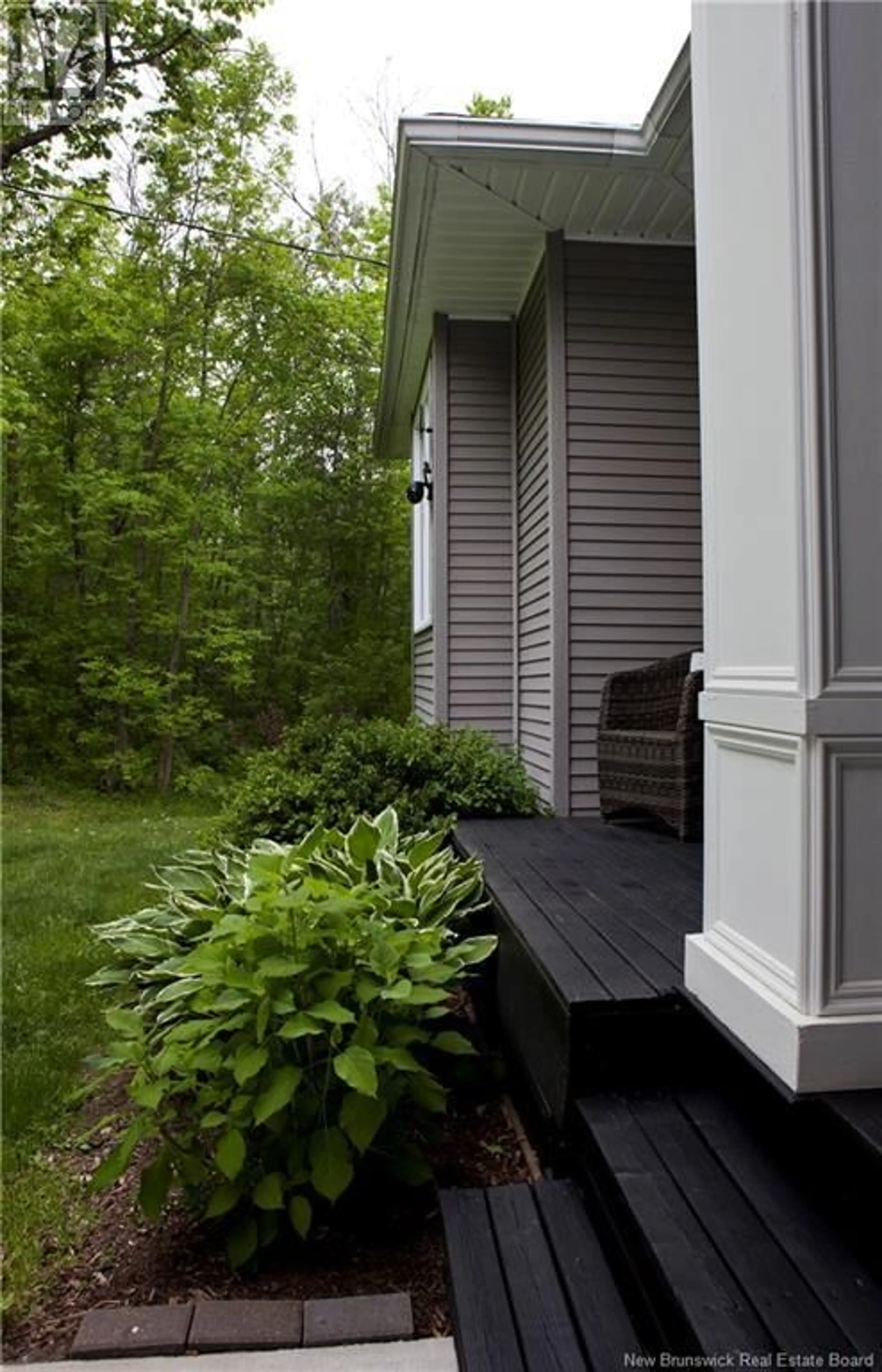 Home with vinyl exterior material, street for 5189 105 ROUTE, Grafton New Brunswick E7N1S3