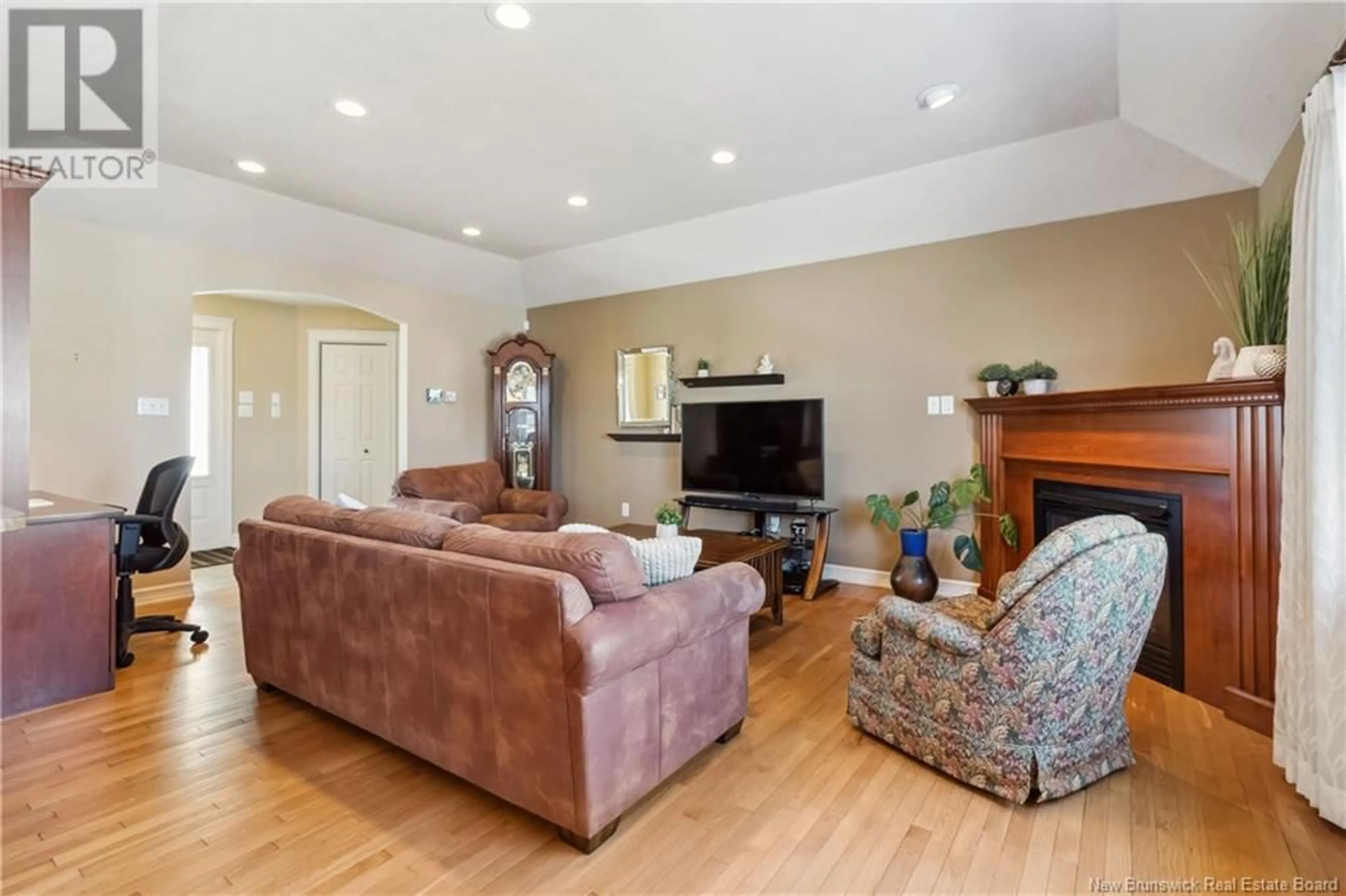 Living room with furniture, wood/laminate floor for 5 Acorn Court, Moncton New Brunswick E1G4X9