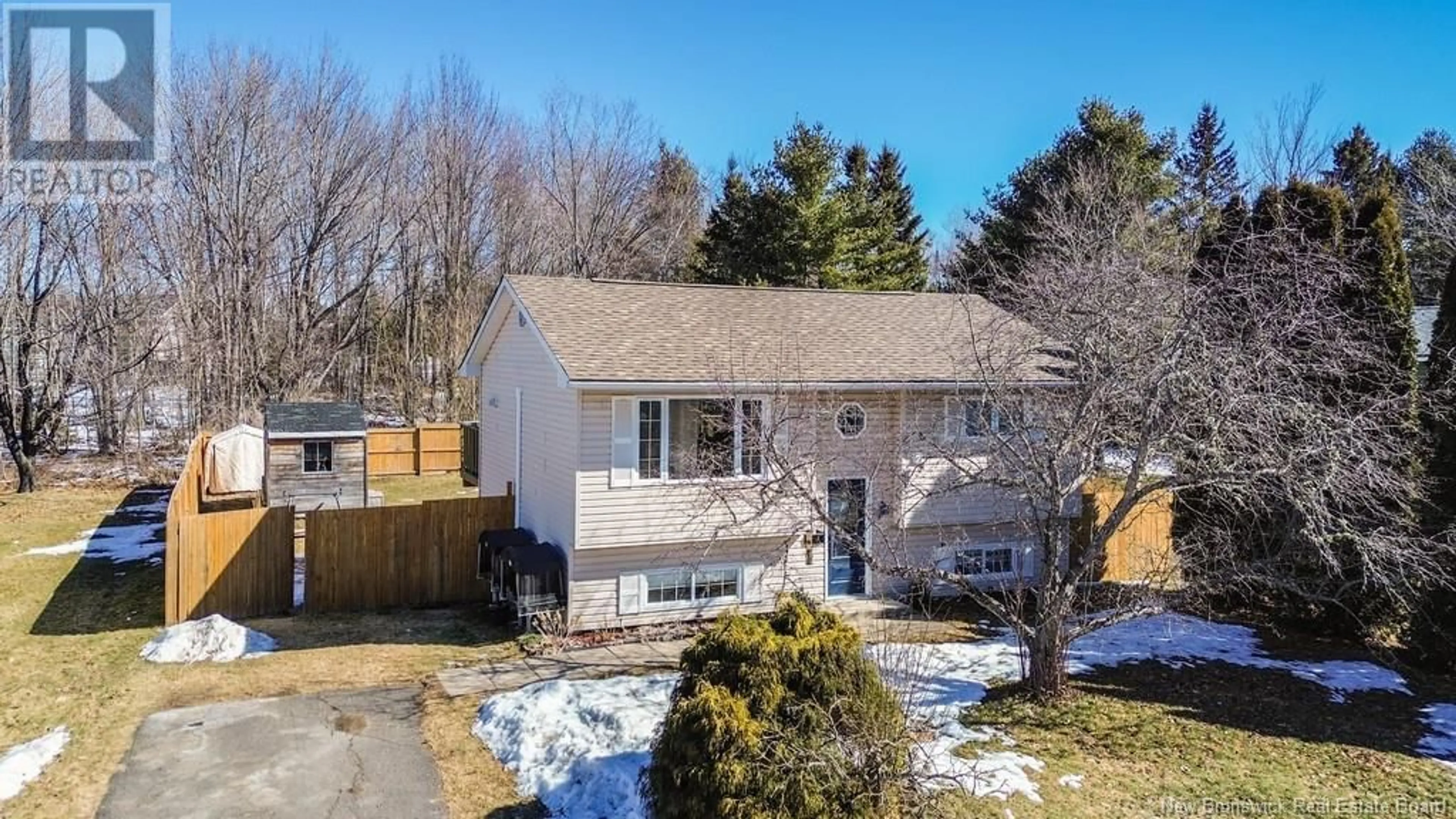 A pic from outside/outdoor area/front of a property/back of a property/a pic from drone, street for 21 Barker Street, Oromocto New Brunswick E2V2K4