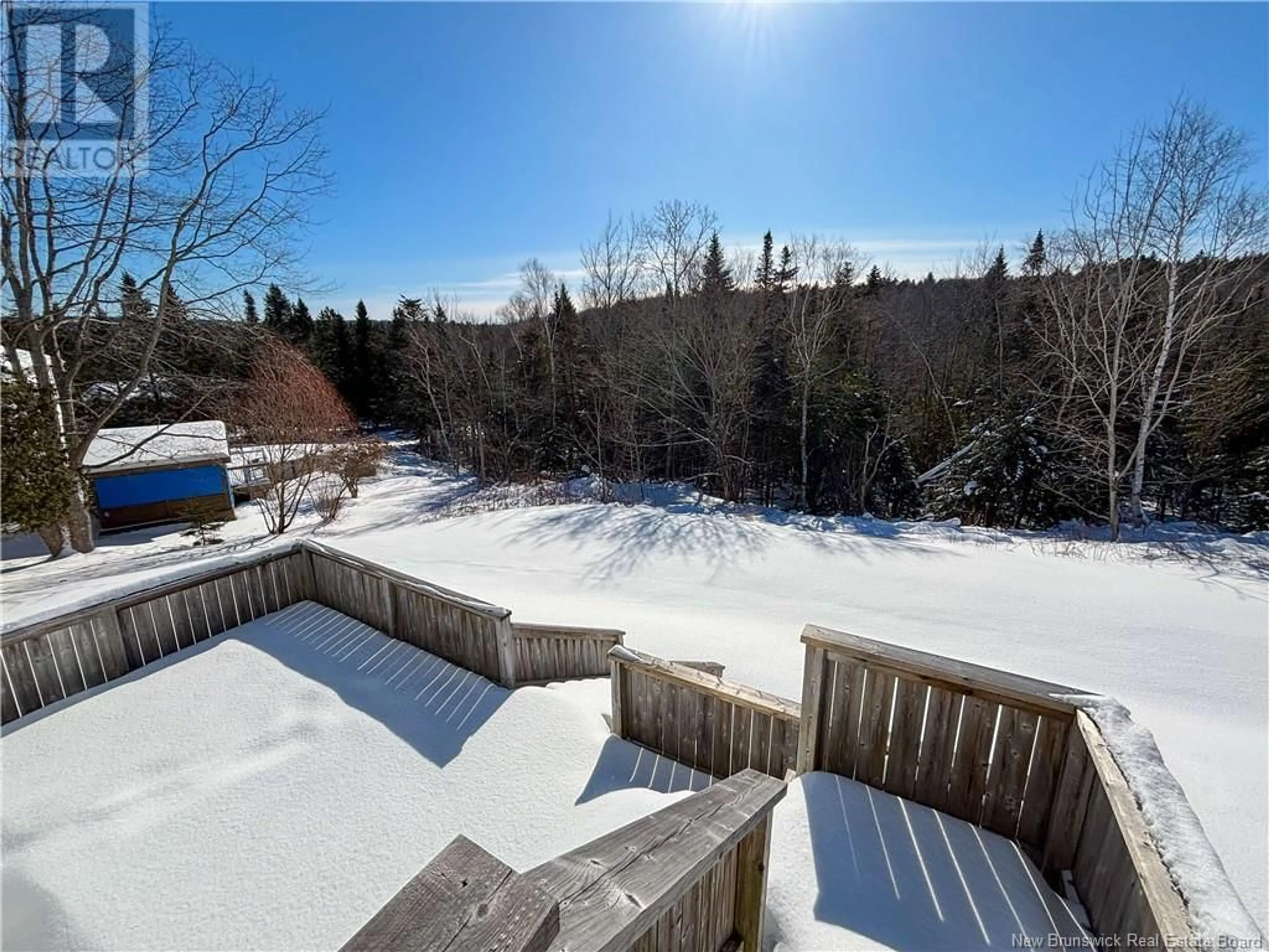 A pic from outside/outdoor area/front of a property/back of a property/a pic from drone, unknown for 10 Rynlon Crescent, Quispamsis New Brunswick E2G1A5