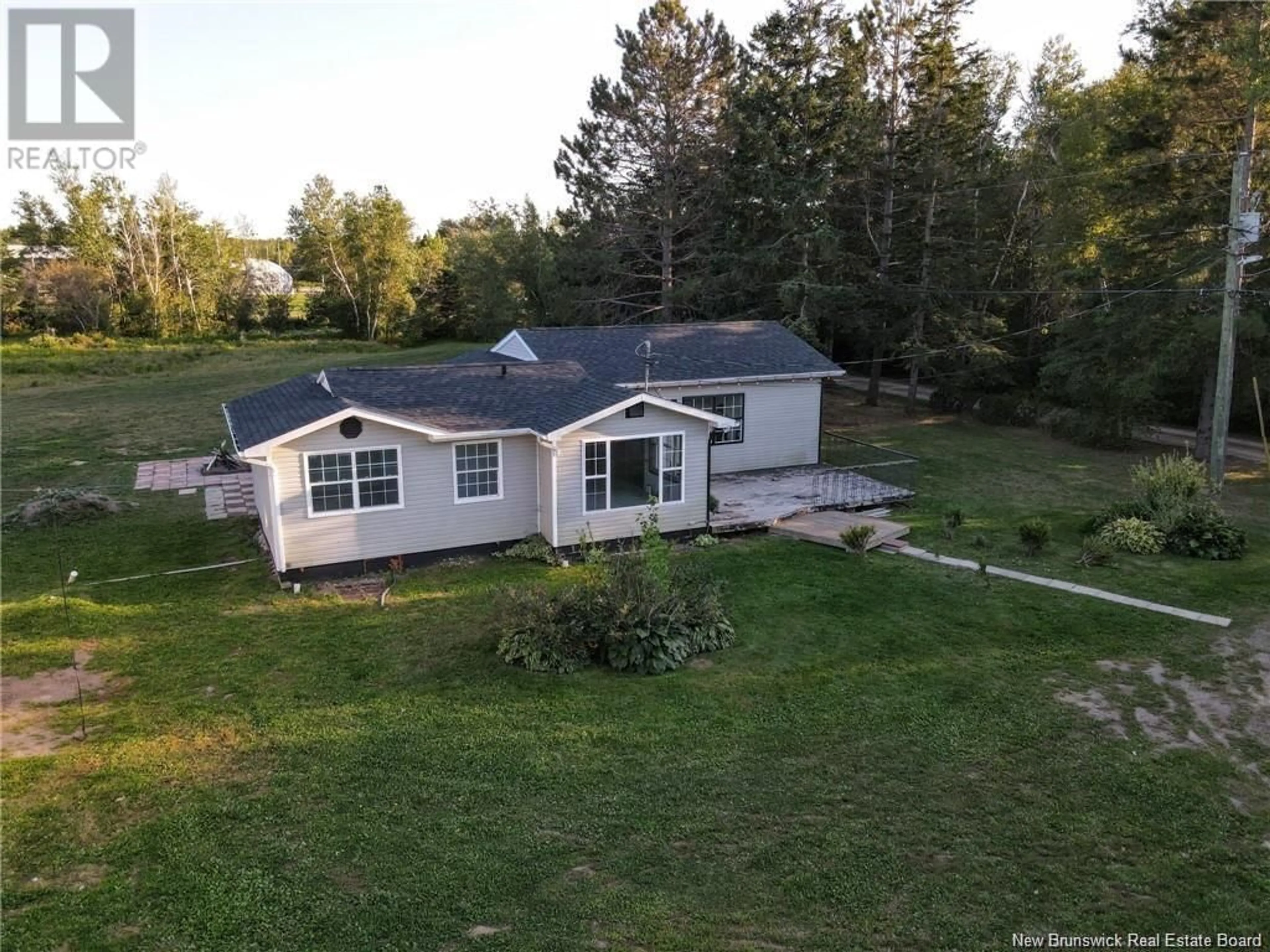 A pic from outside/outdoor area/front of a property/back of a property/a pic from drone, unknown for 21 OLIVIER ROAD, Beaubassin East New Brunswick E4P7X6