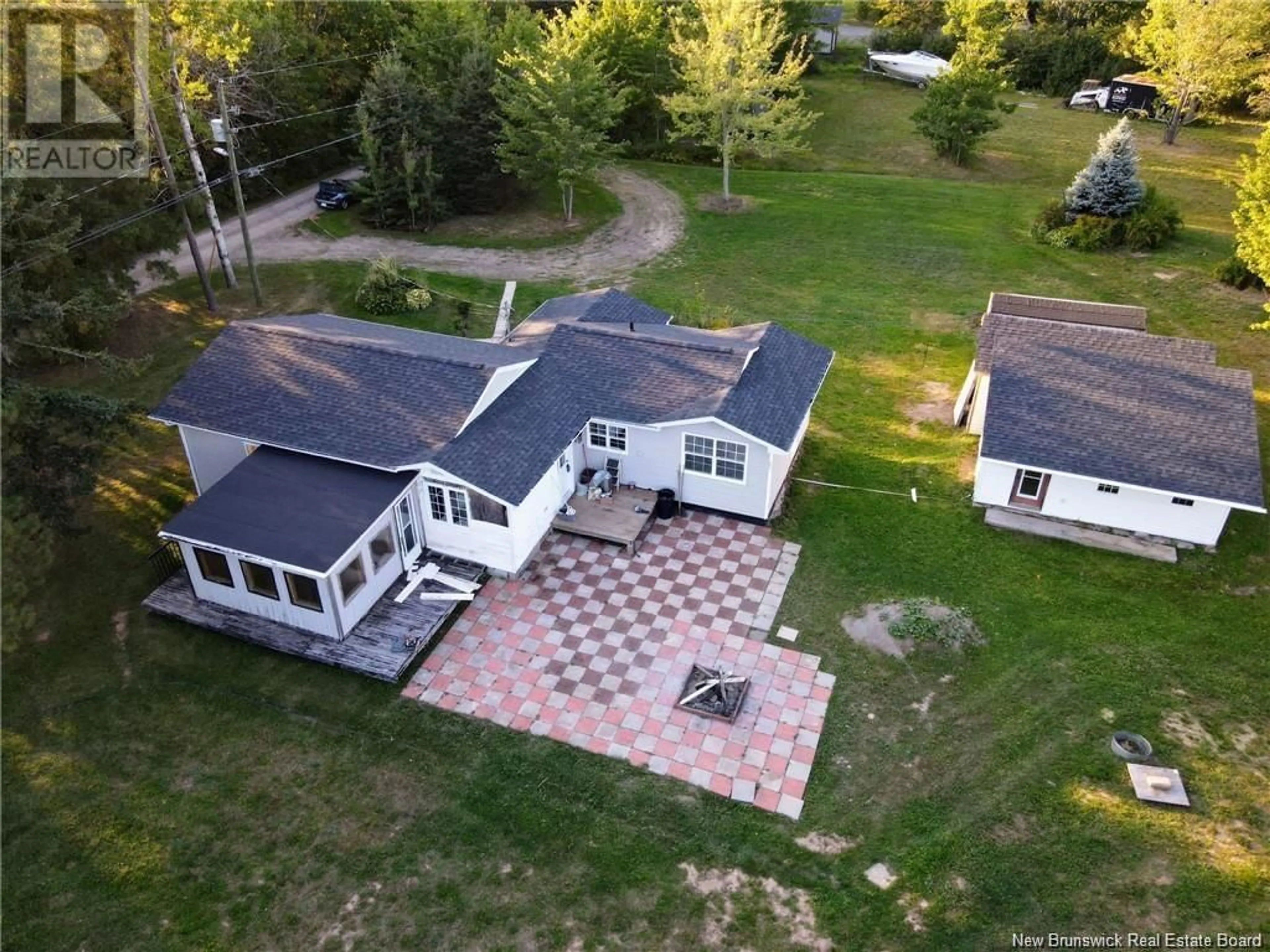 A pic from outside/outdoor area/front of a property/back of a property/a pic from drone, unknown for 21 OLIVIER ROAD, Beaubassin East New Brunswick E4P7X6