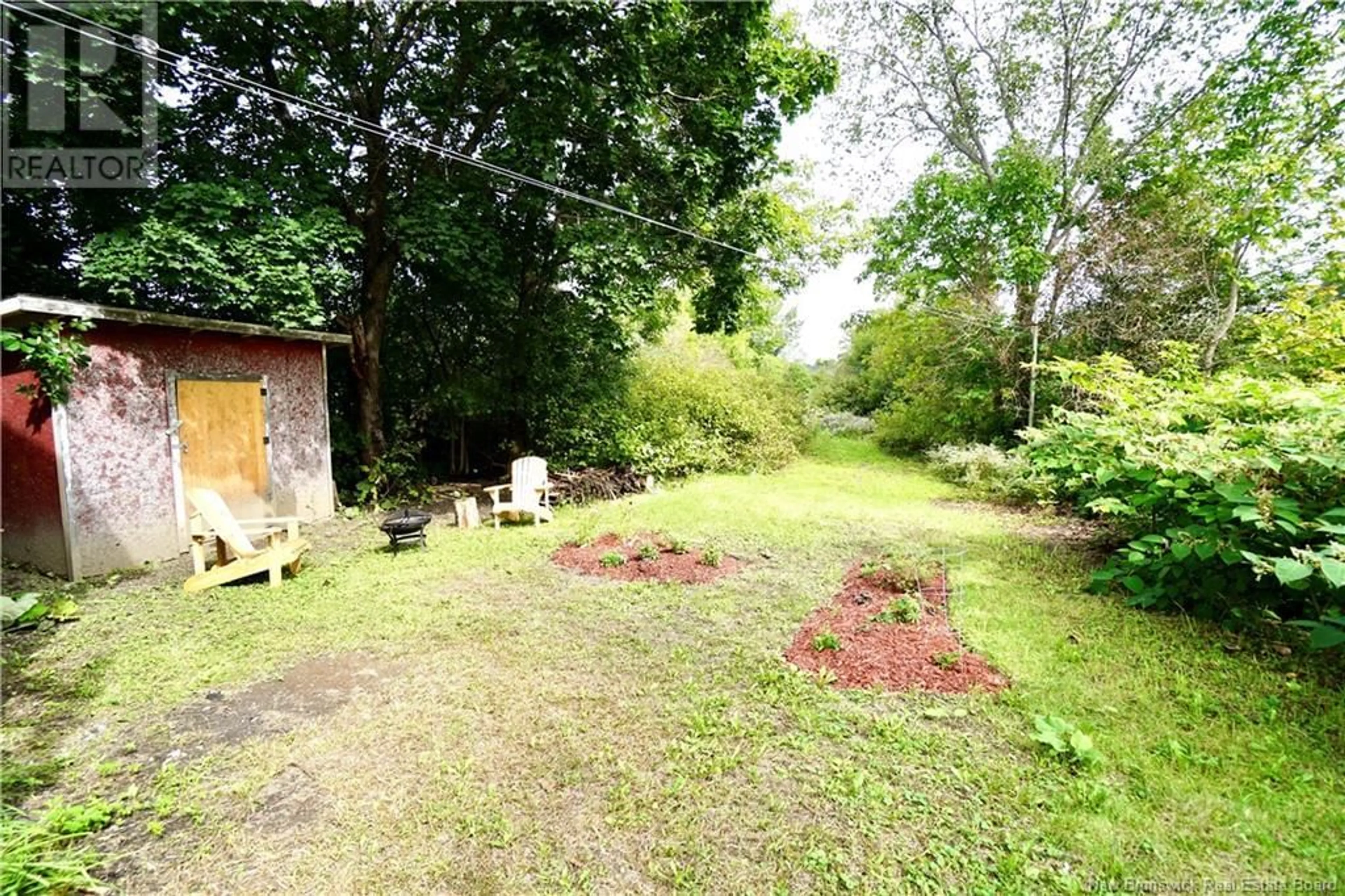 Patio, forest/trees view for 40 Spring Street, St. Stephen New Brunswick E3L1K8