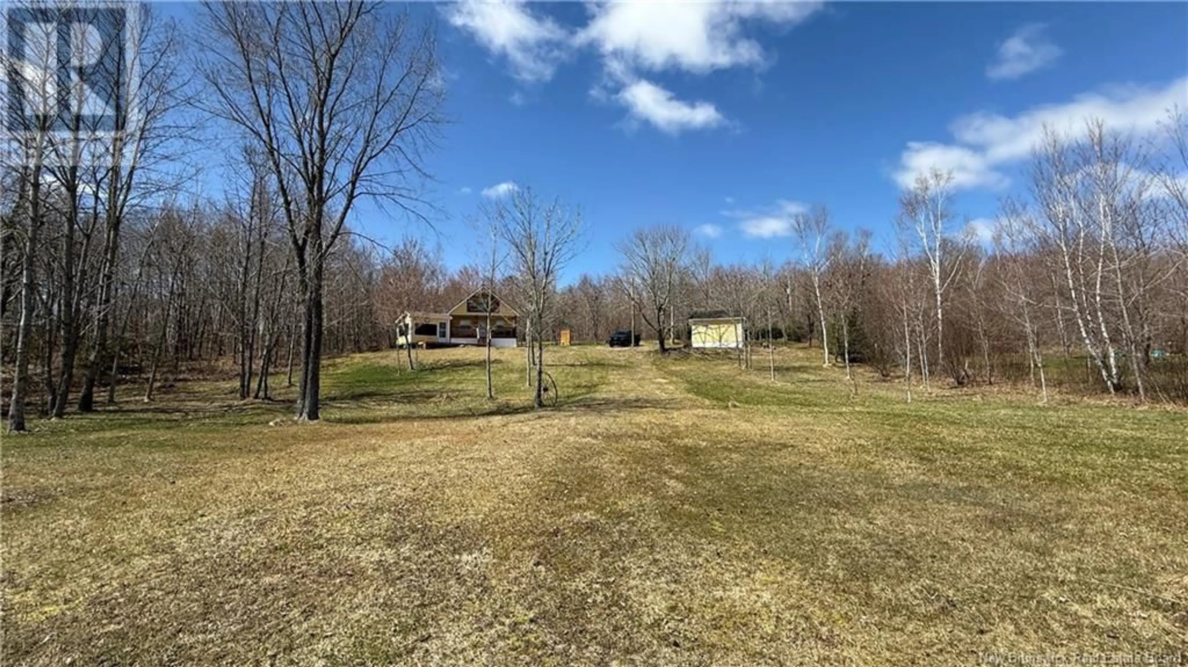 A pic from outside/outdoor area/front of a property/back of a property/a pic from drone, forest/trees view for 9 STEVENSON LANE, East Grand Lake New Brunswick E6H1Y6