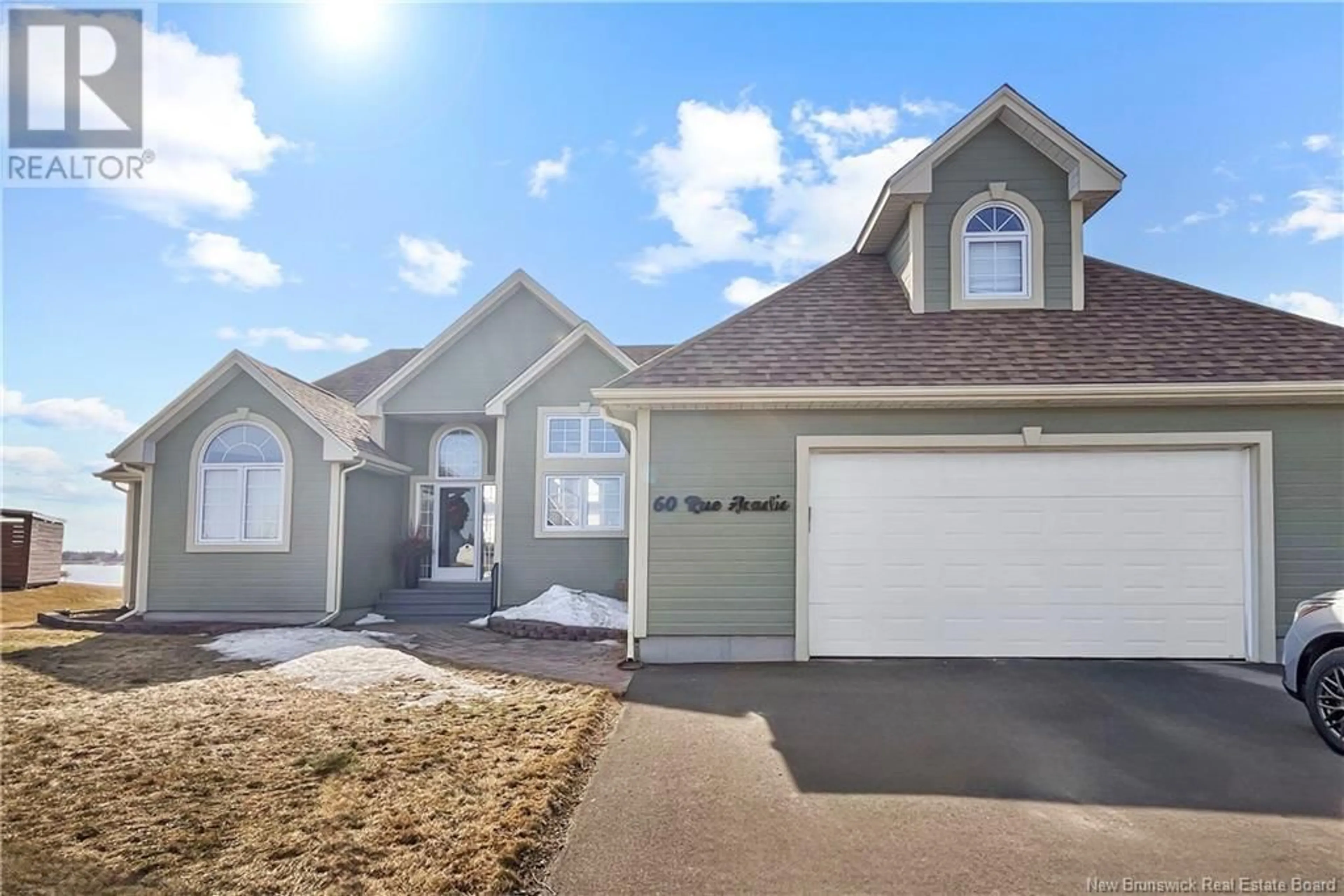 Home with vinyl exterior material, street for 60 ACADIE, Cocagne New Brunswick E4R5Y6
