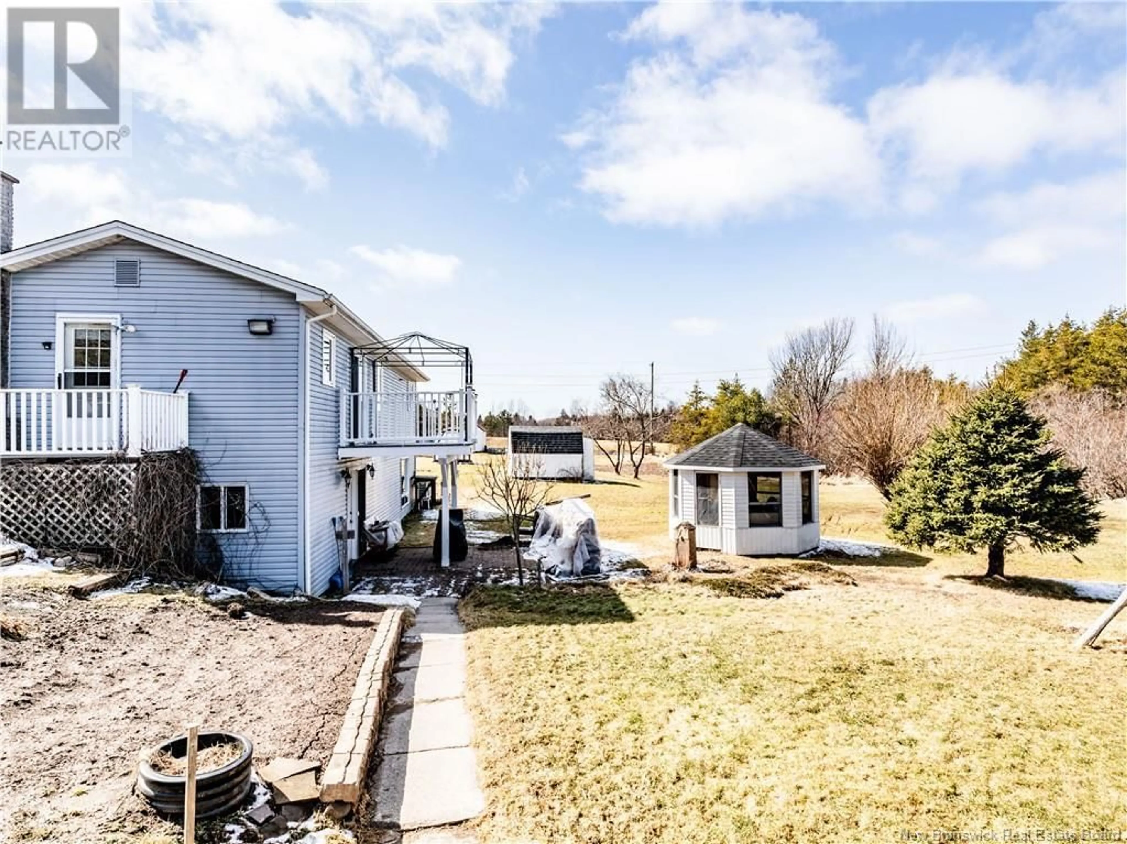 A pic from outside/outdoor area/front of a property/back of a property/a pic from drone, forest/trees view for 64 PELLERIN, Sainte-Marie-De-Kent New Brunswick E4S1T5