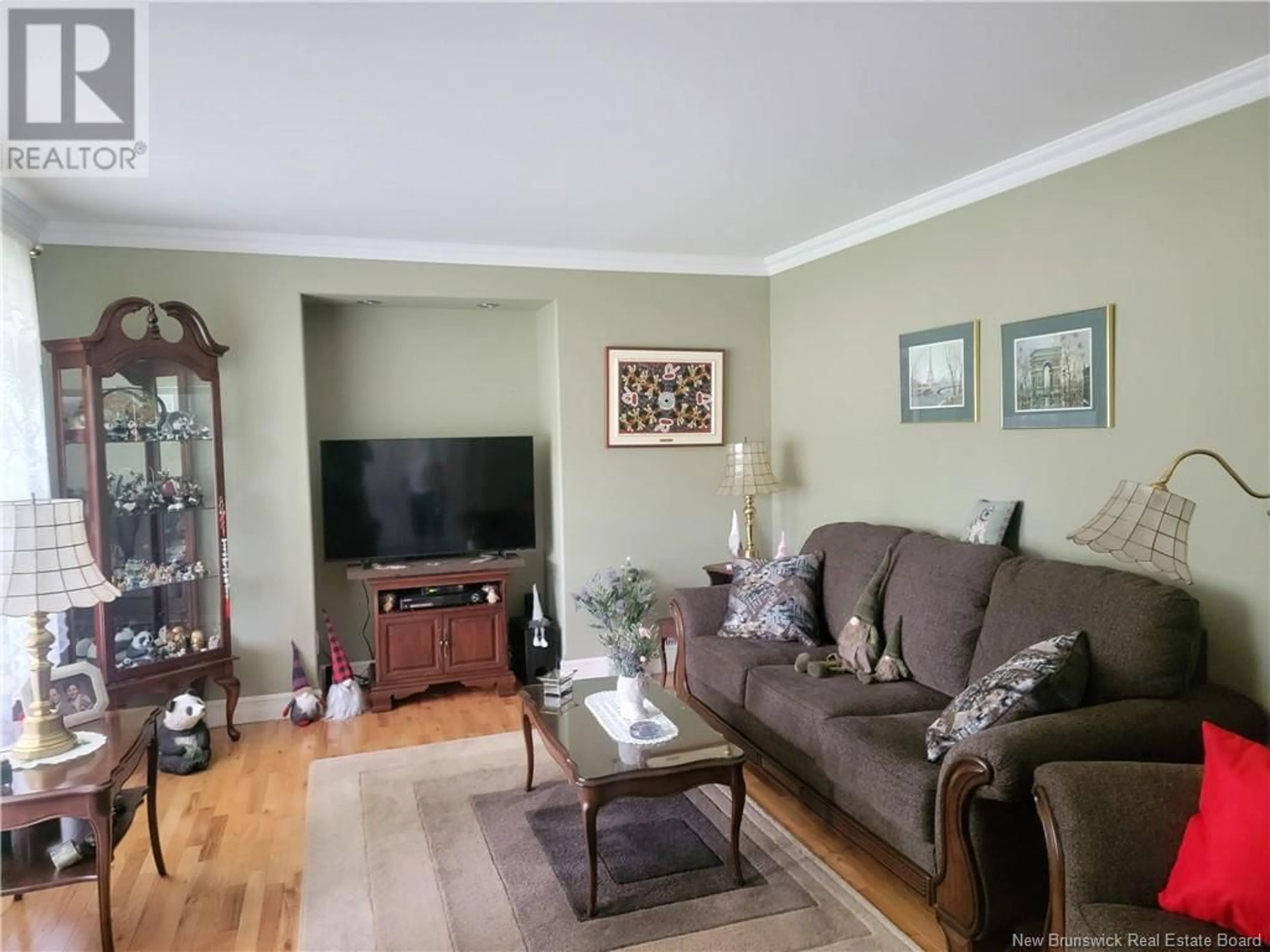 Living room with furniture, wood/laminate floor for 967 HAY CRES, Bathurst New Brunswick E2A3S1