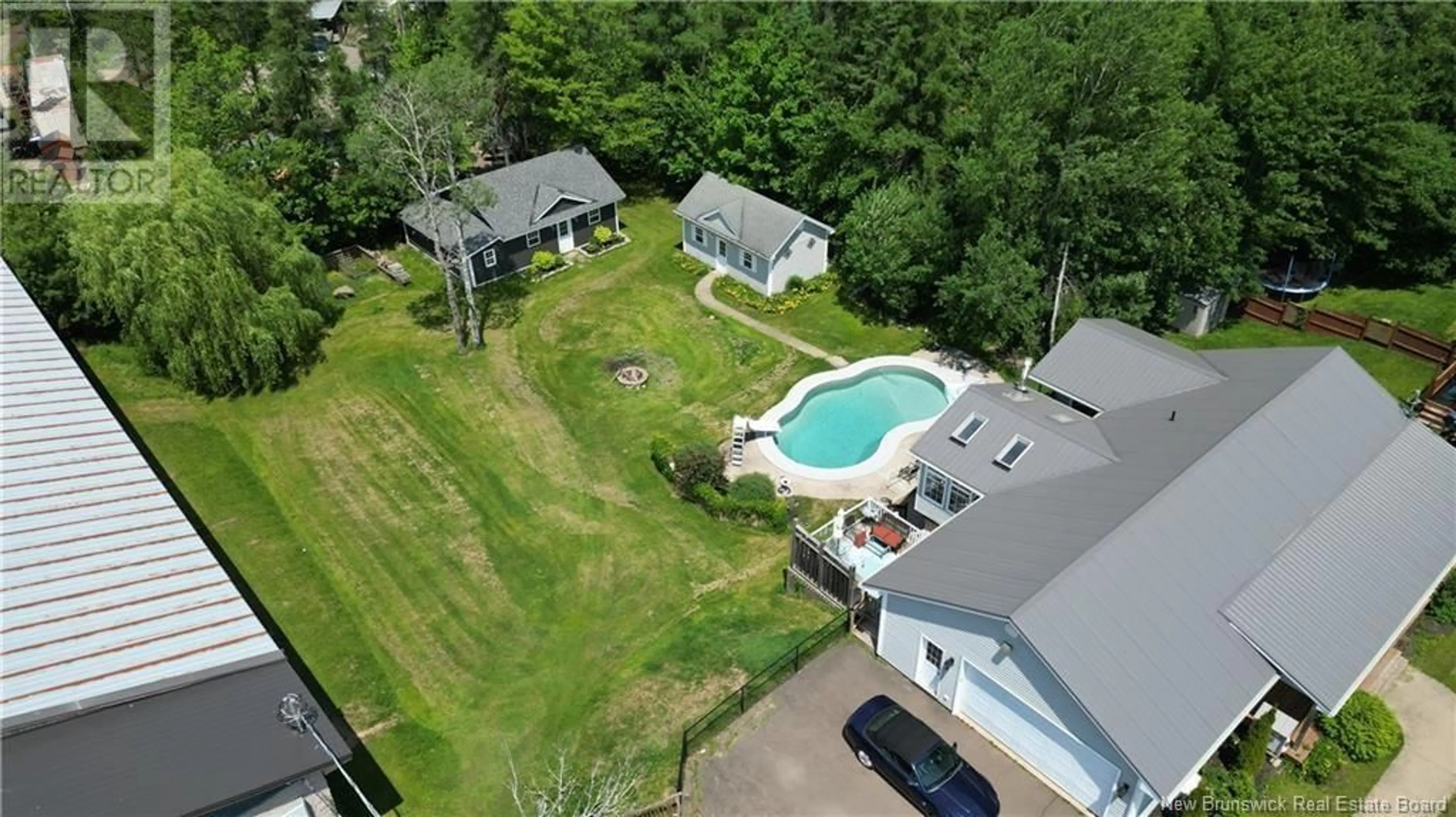 A pic from outside/outdoor area/front of a property/back of a property/a pic from drone, water/lake/river/ocean view for 617 SALISBURY ROAD, Moncton New Brunswick E1E1B9