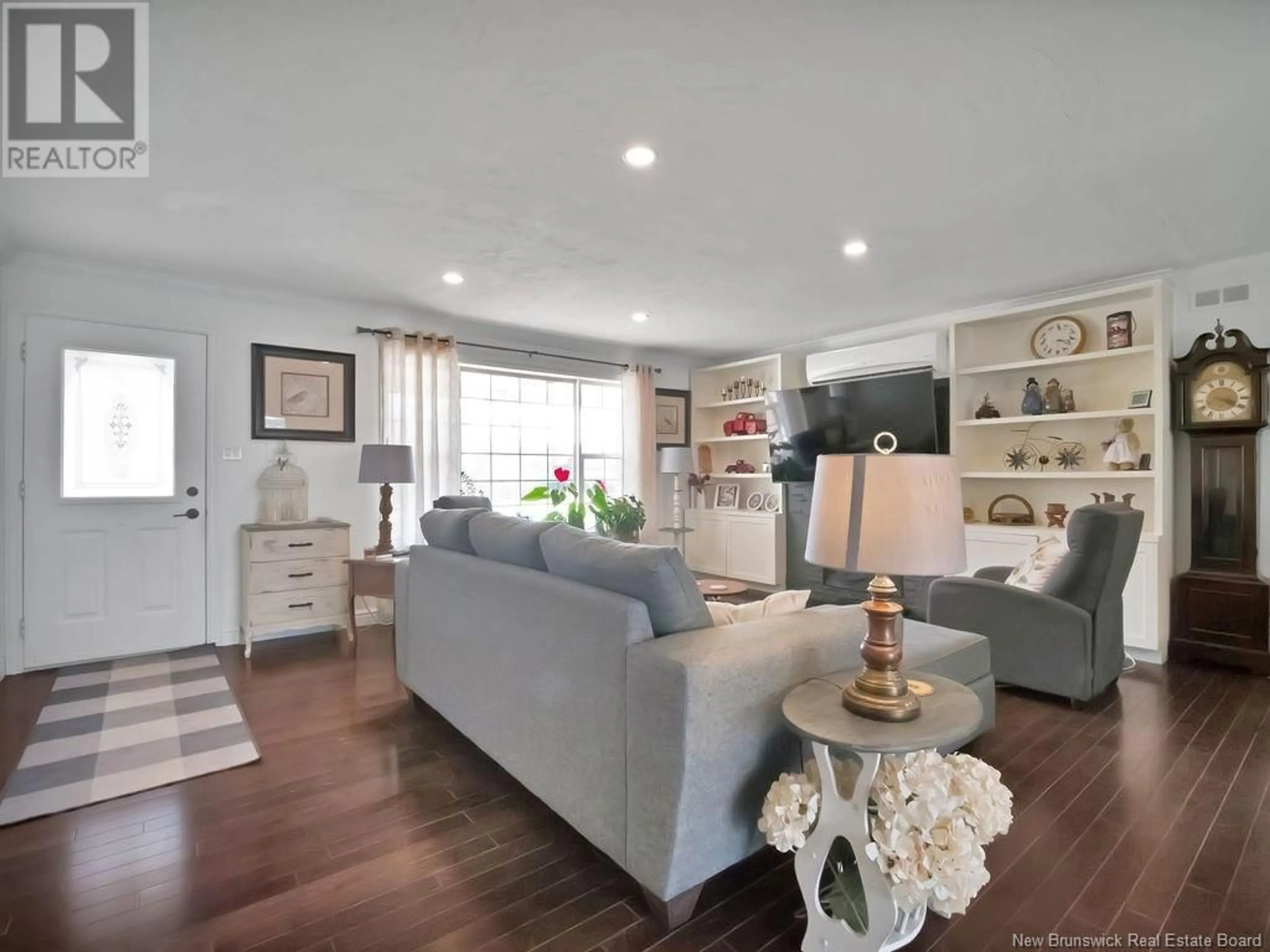 Living room with furniture, wood/laminate floor for 617 SALISBURY ROAD, Moncton New Brunswick E1E1B9