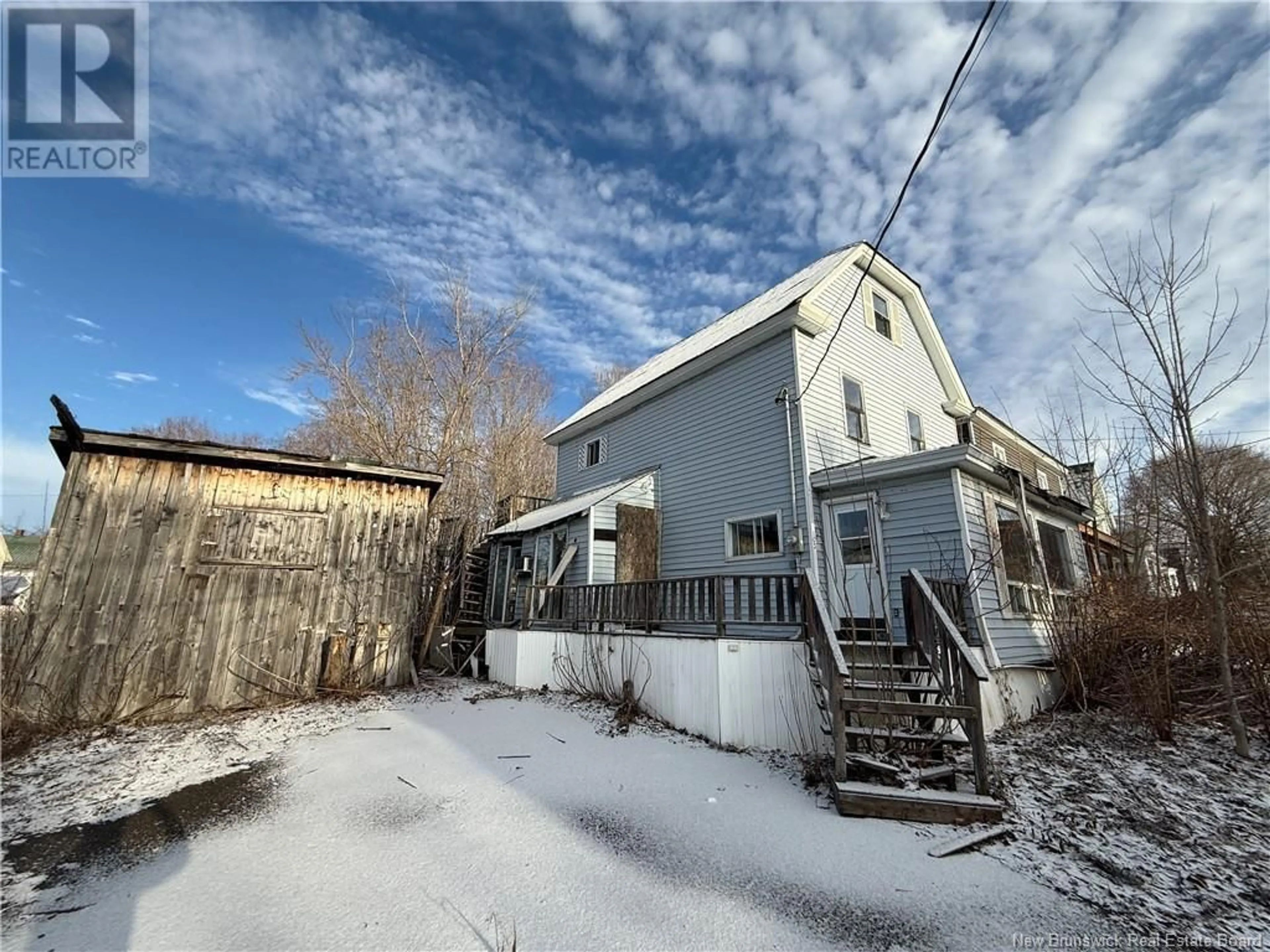 A pic from outside/outdoor area/front of a property/back of a property/a pic from drone, street for 103 Cedar Street, Woodstock New Brunswick E7M1E5