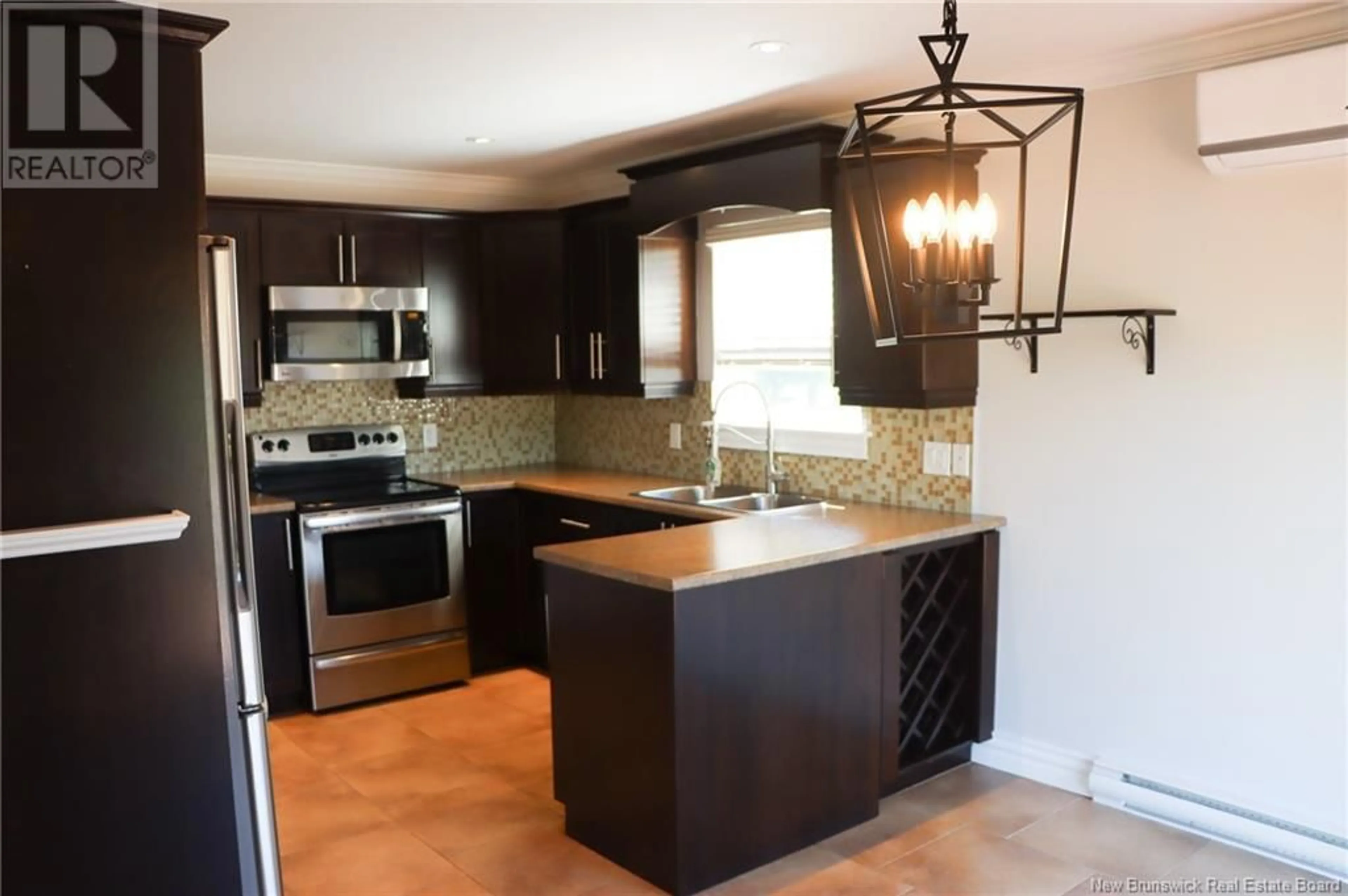 Open concept kitchen, ceramic/tile floor for 153 SHORE DRIVE, Shediac New Brunswick E4P2S4