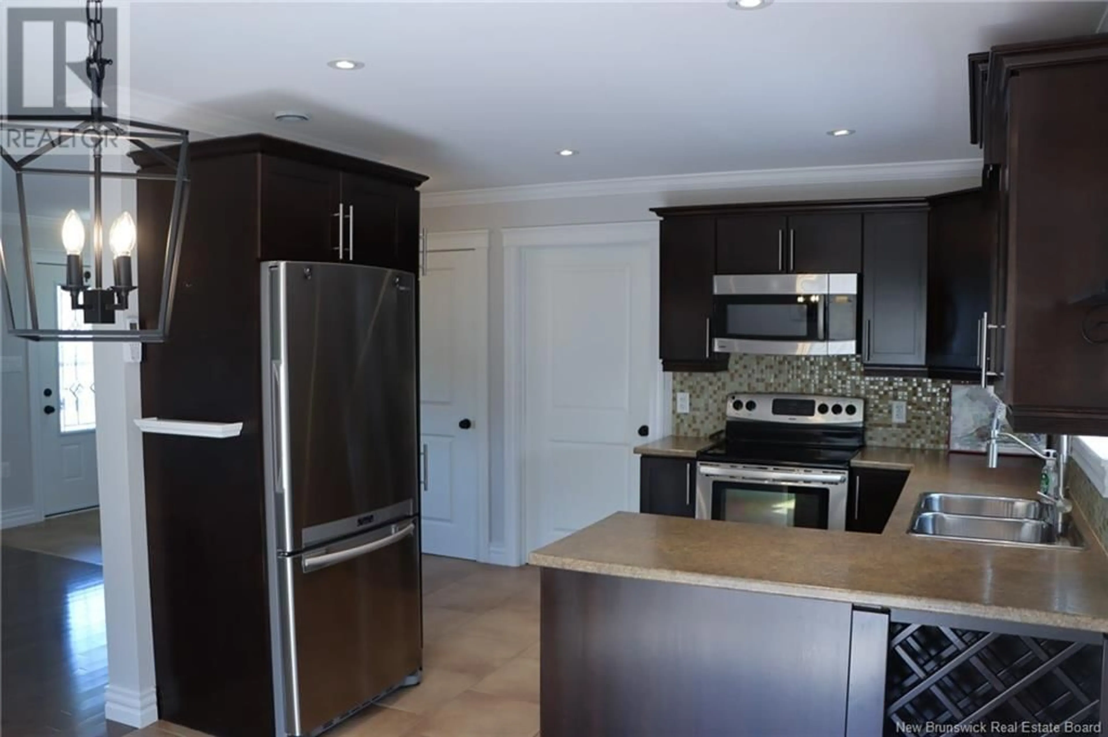 Open concept kitchen, ceramic/tile floor for 153 SHORE DRIVE, Shediac New Brunswick E4P2S4