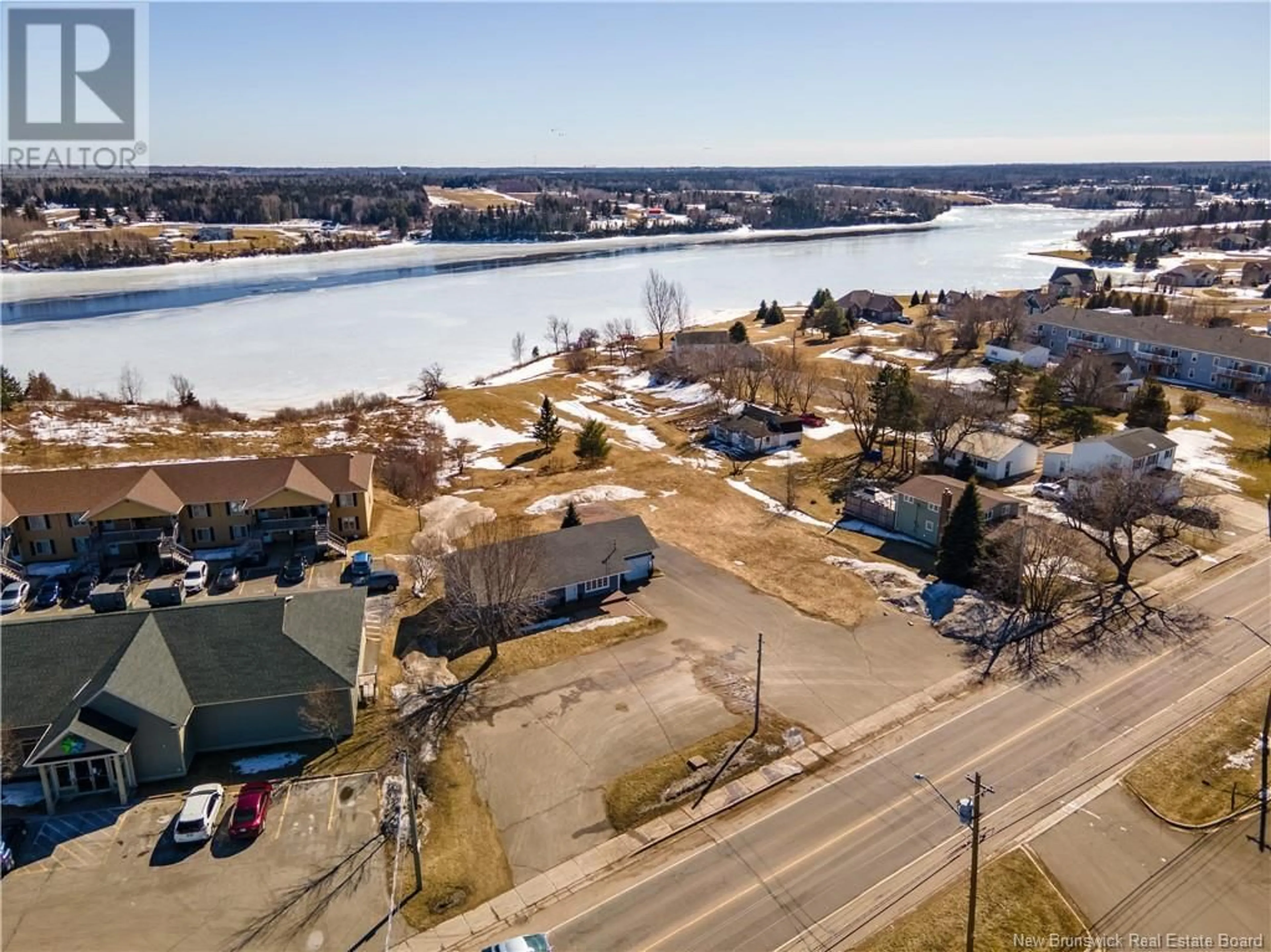 A pic from outside/outdoor area/front of a property/back of a property/a pic from drone, water/lake/river/ocean view for 200 IRVING BOULEVARD, Bouctouche New Brunswick E4S3L7
