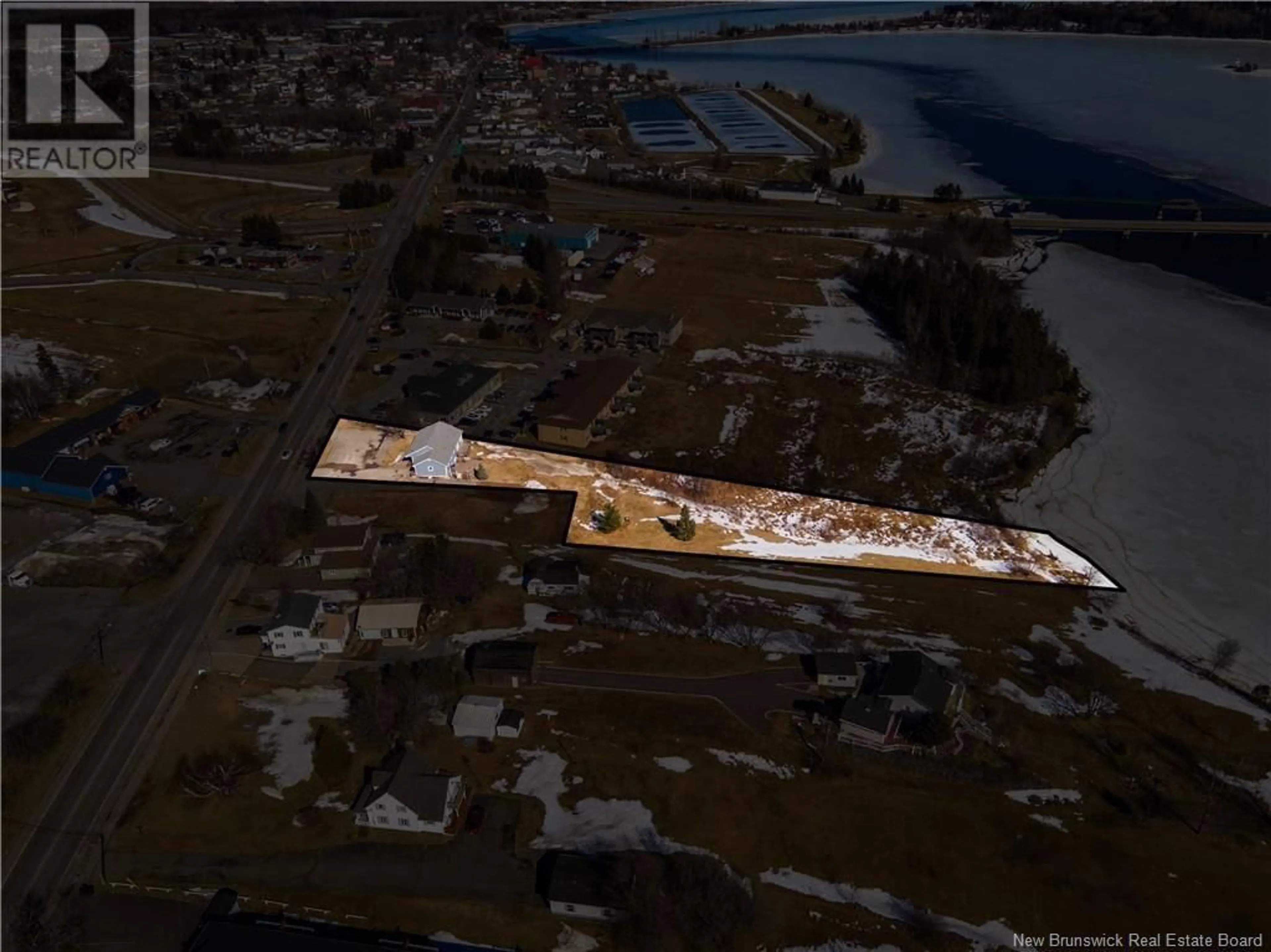 A pic from outside/outdoor area/front of a property/back of a property/a pic from drone, water/lake/river/ocean view for 200 IRVING BOULEVARD, Bouctouche New Brunswick E4S3L7