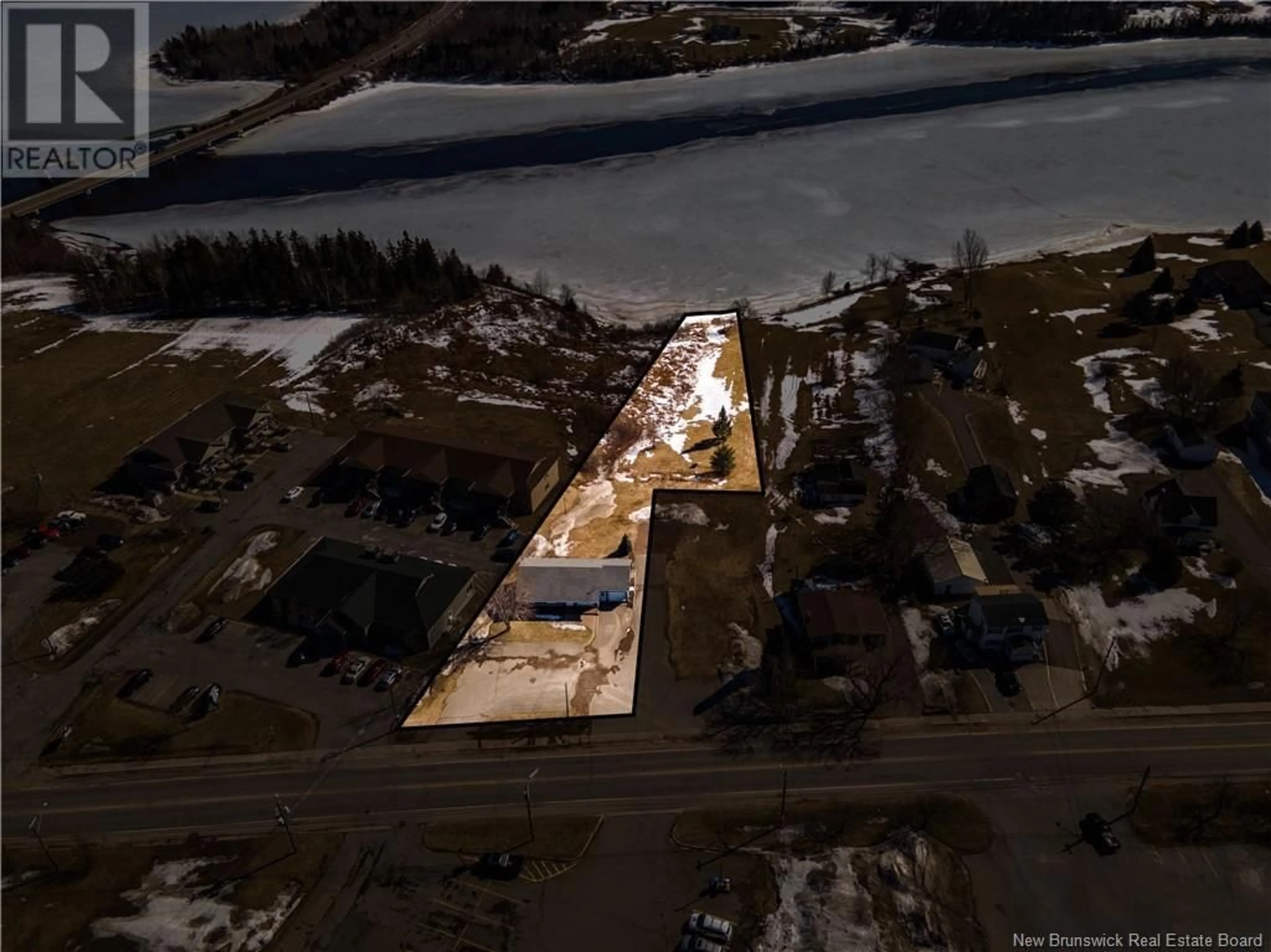 A pic from outside/outdoor area/front of a property/back of a property/a pic from drone, water/lake/river/ocean view for 200 IRVING BOULEVARD, Bouctouche New Brunswick E4S3L7