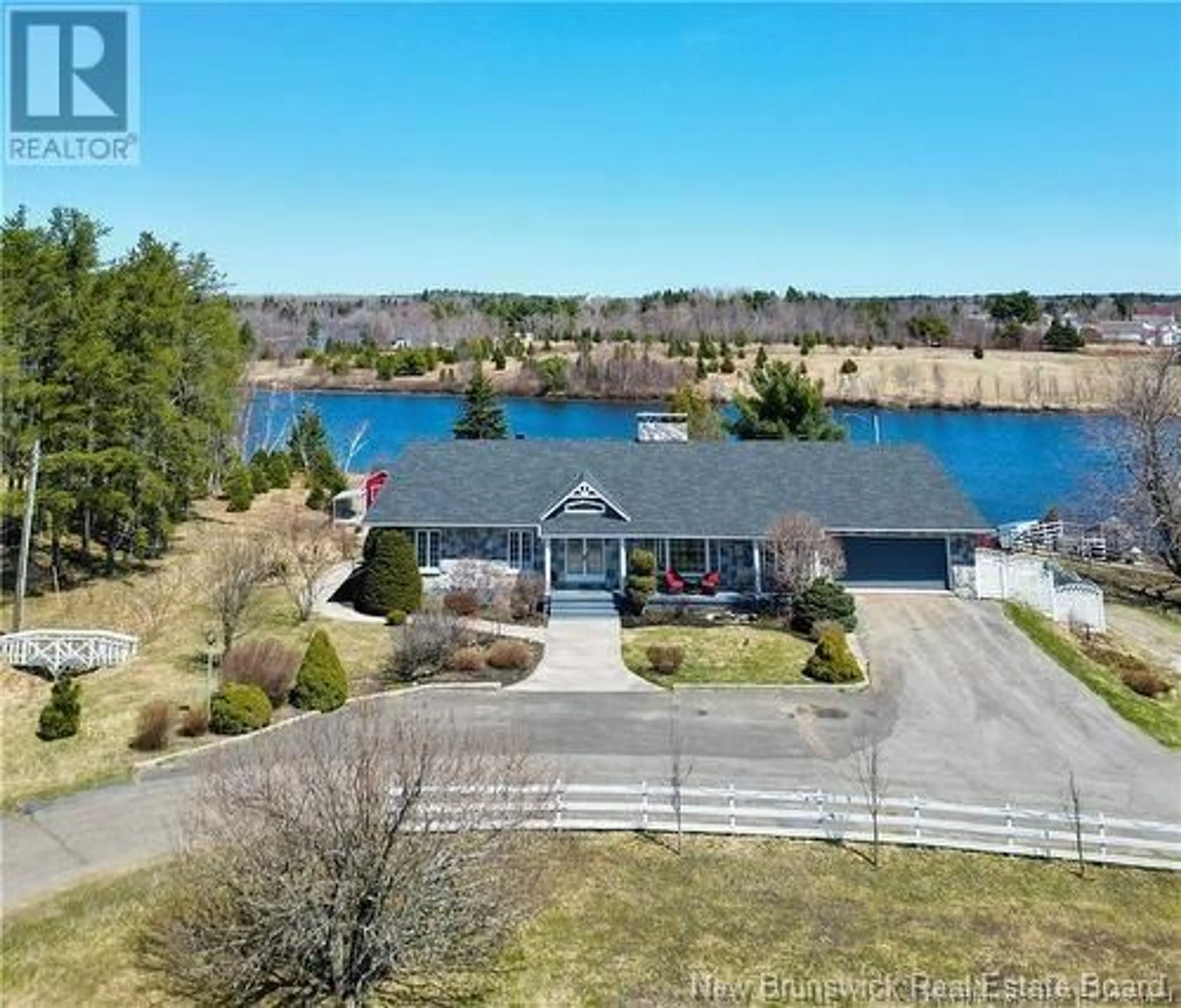 A pic from outside/outdoor area/front of a property/back of a property/a pic from drone, water/lake/river/ocean view for 315 CH RIVIERE DU PORTAGE NORD, Haut-Rivière-du-Portage New Brunswick E9H1R4