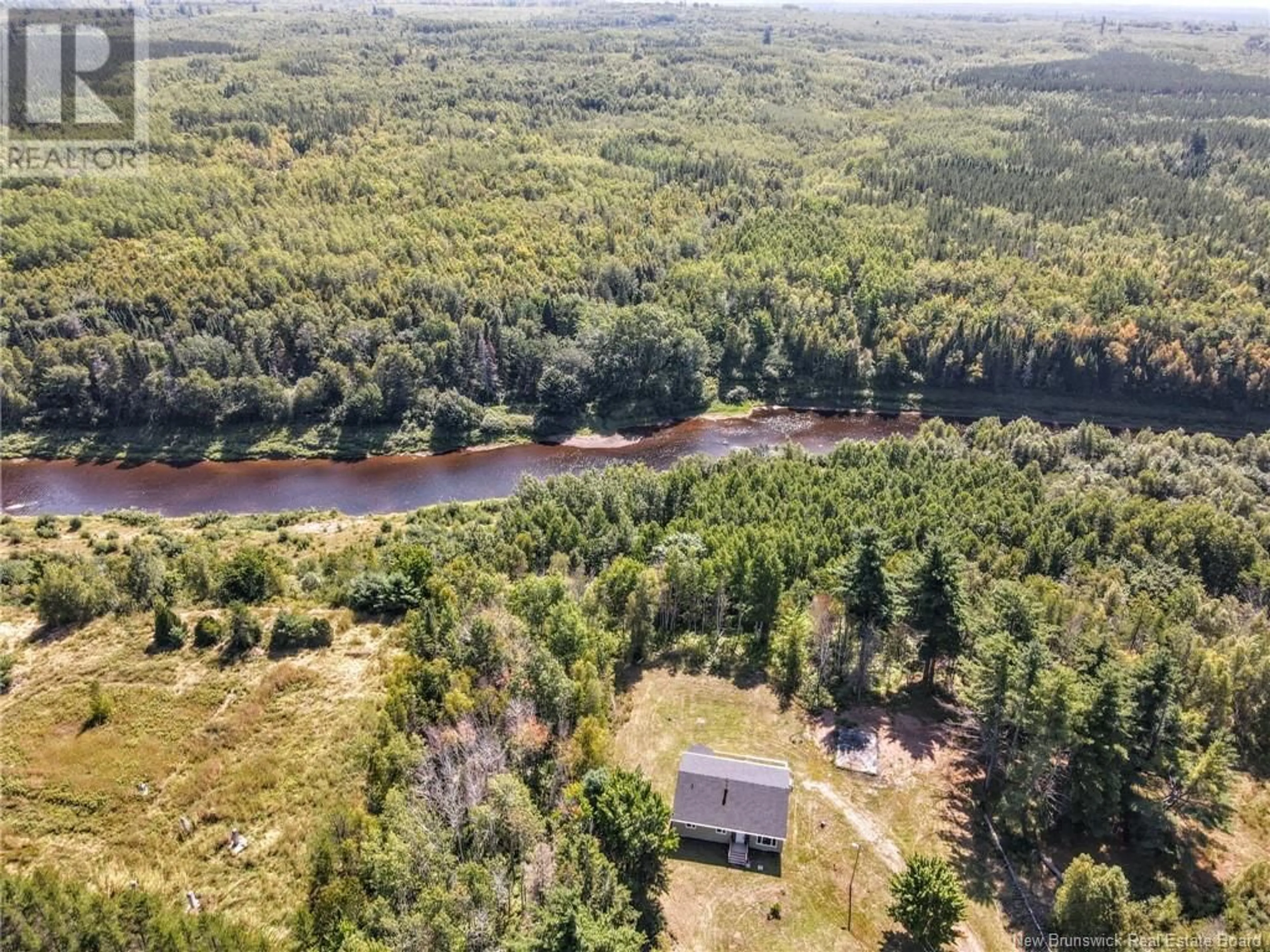 A pic from outside/outdoor area/front of a property/back of a property/a pic from drone, water/lake/river/ocean view for 7220 ROUTE 112, Hunters Home New Brunswick E4J4J1