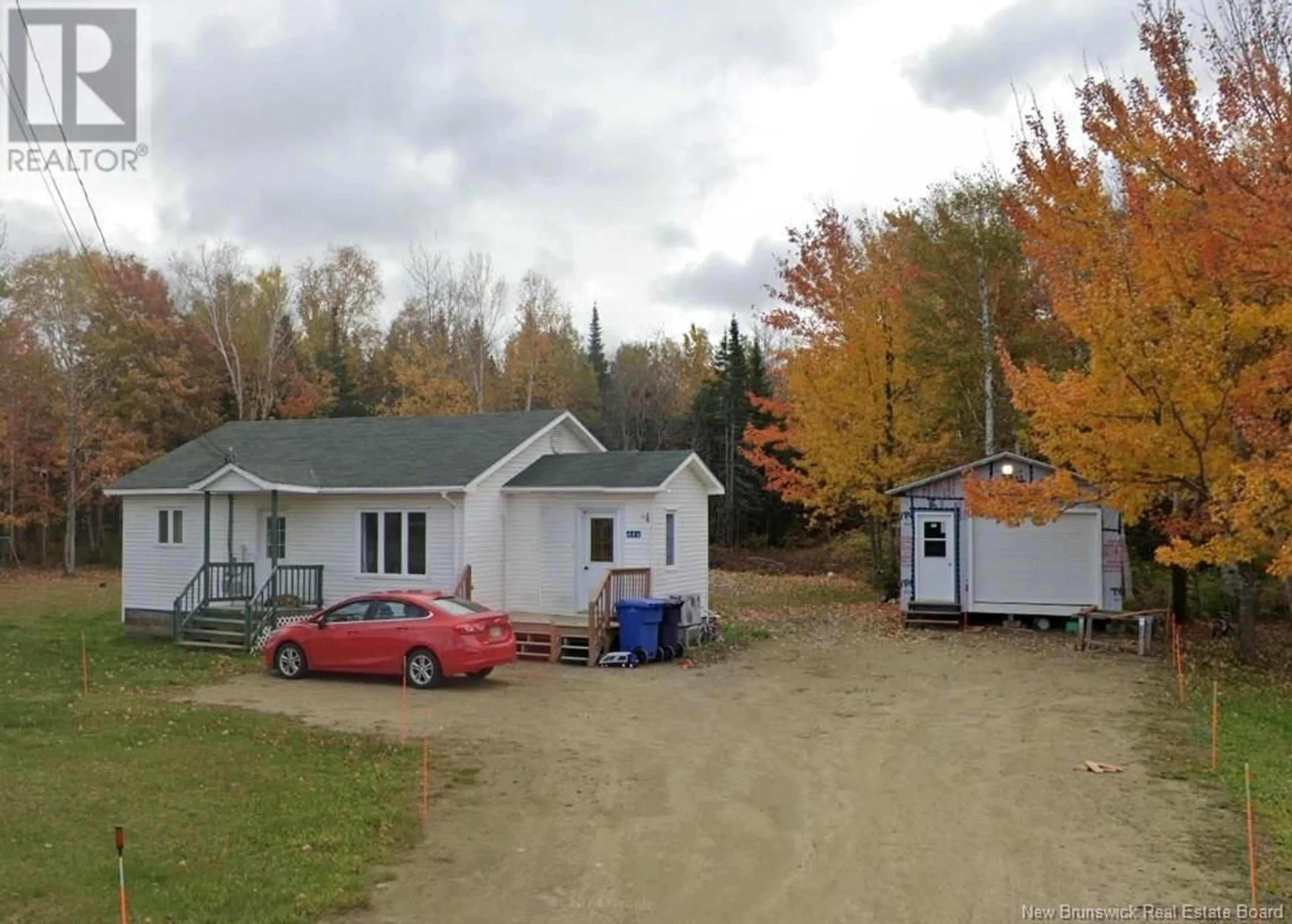 A pic from outside/outdoor area/front of a property/back of a property/a pic from drone, unknown for 446 Rte 450, Lavillette New Brunswick E9G2R8