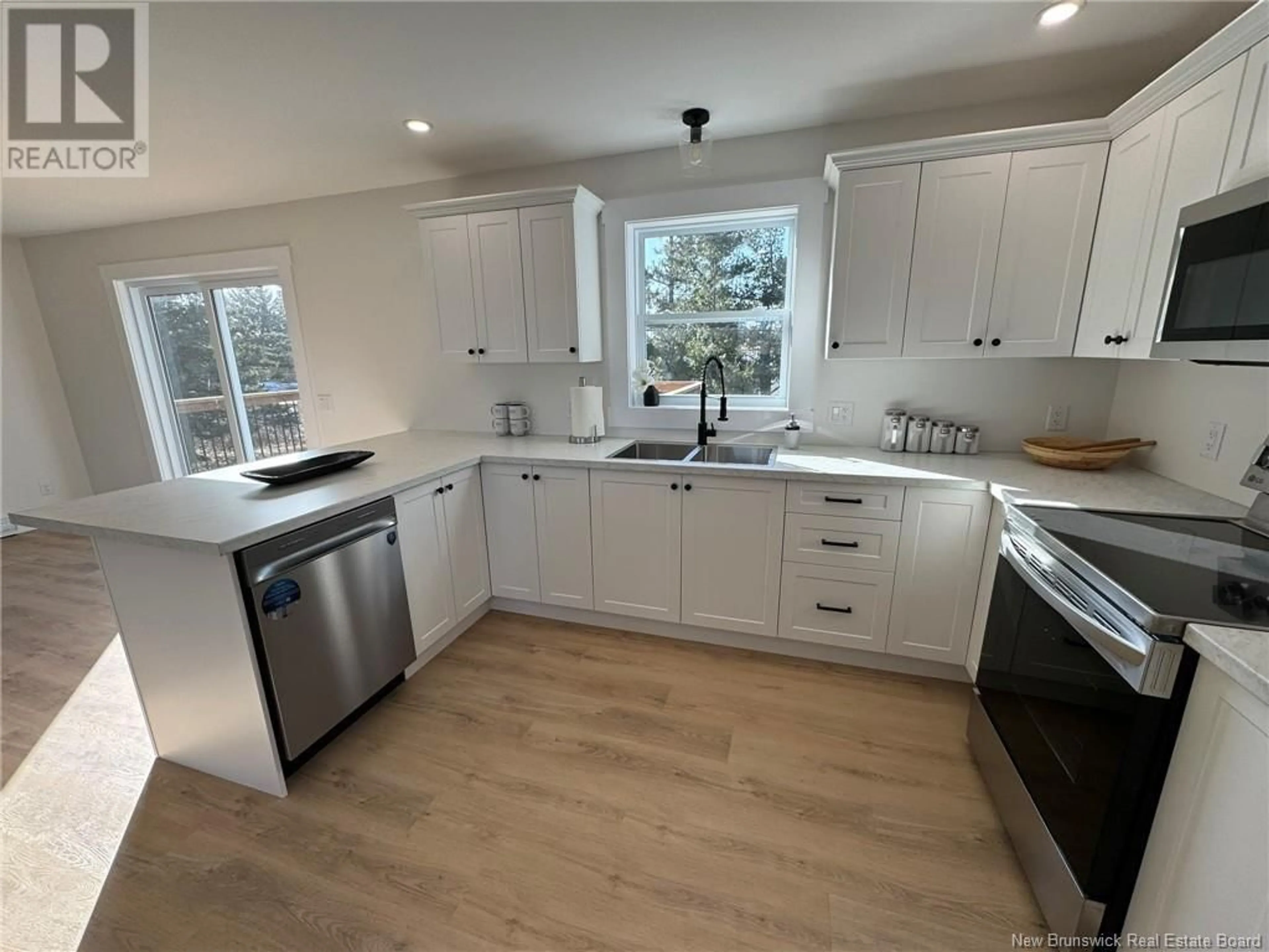 Open concept kitchen, ceramic/tile floor for 23 SEWELL ROAD, Jacksonville New Brunswick E7M3S1