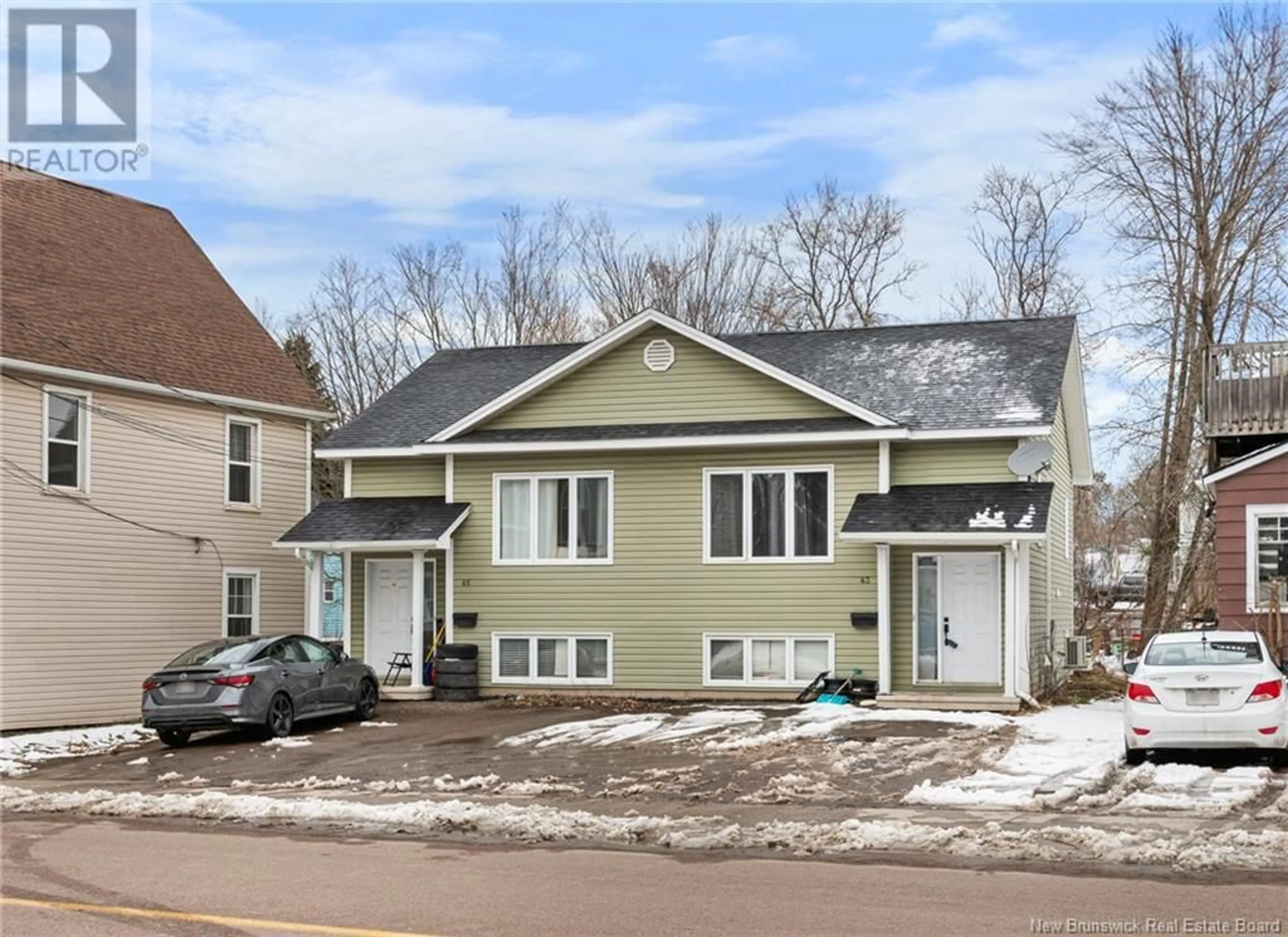 Home with vinyl exterior material, street for 43-45 MILL ROAD, Moncton New Brunswick E1A4A3