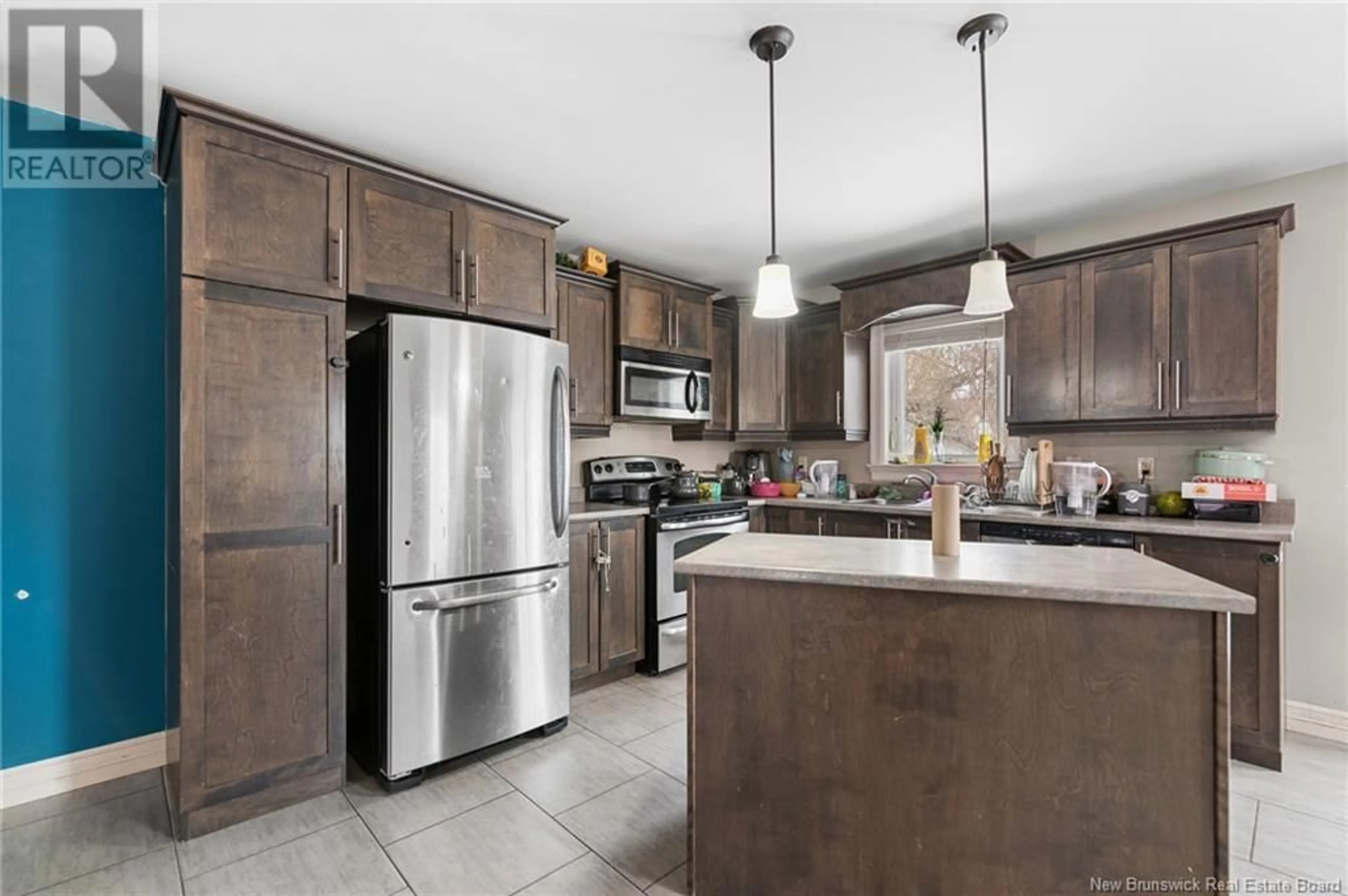Open concept kitchen, ceramic/tile floor for 43-45 MILL ROAD, Moncton New Brunswick E1A4A3