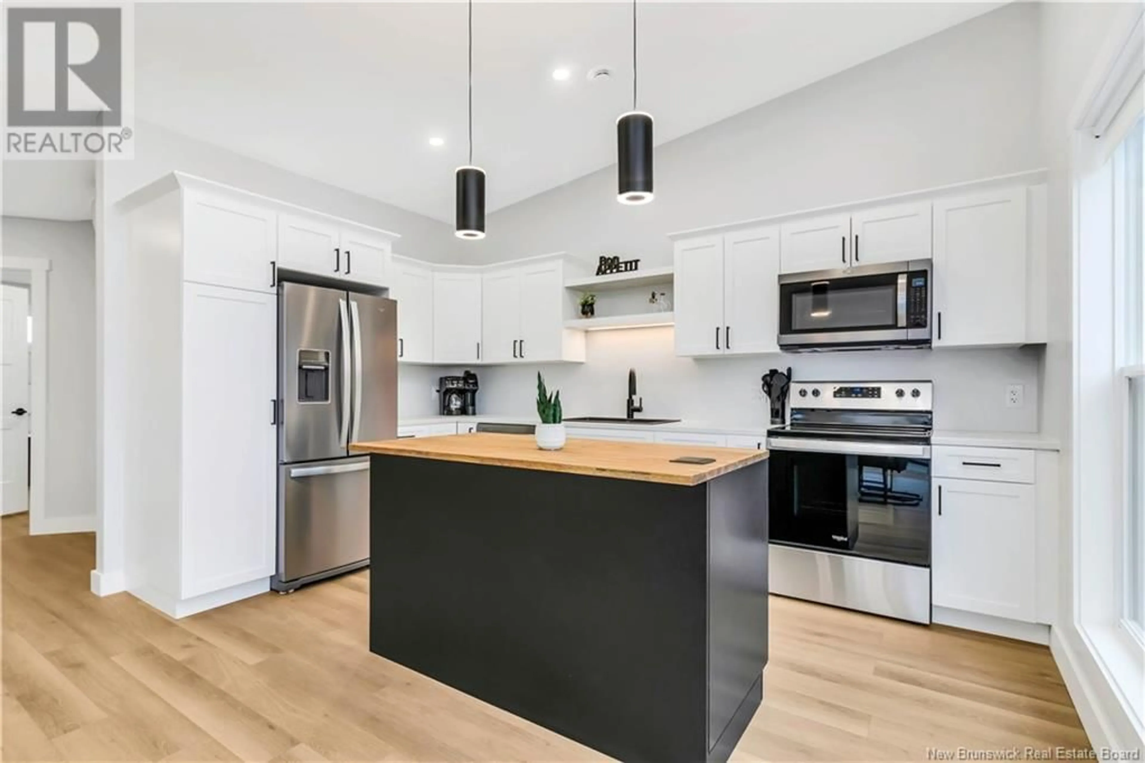 Open concept kitchen, wood/laminate floor for 89-91 YORK, Richibucto New Brunswick E4W4K2