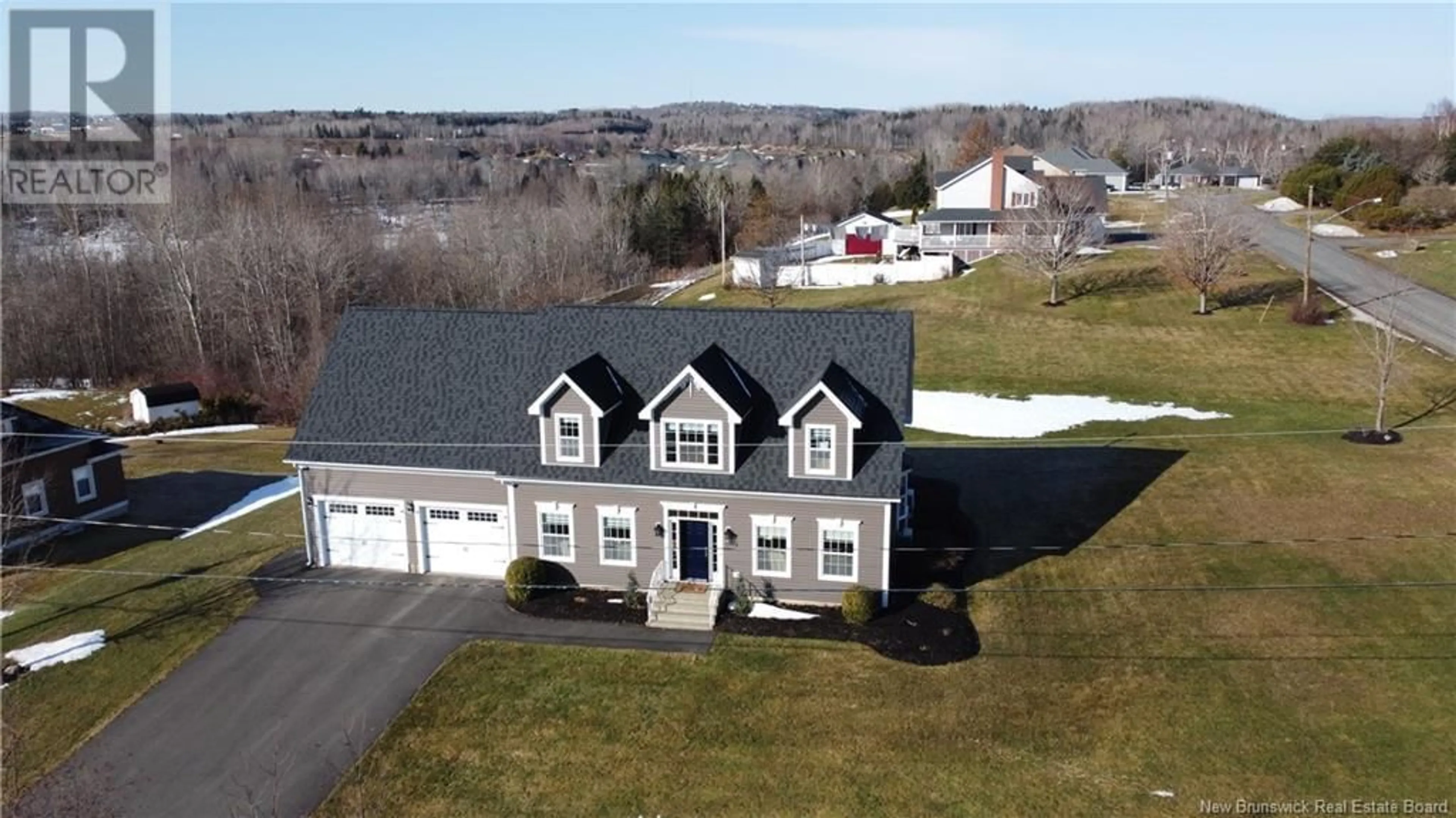 A pic from outside/outdoor area/front of a property/back of a property/a pic from drone, building for 102 Osprey Court, Woodstock New Brunswick E7M5Z5