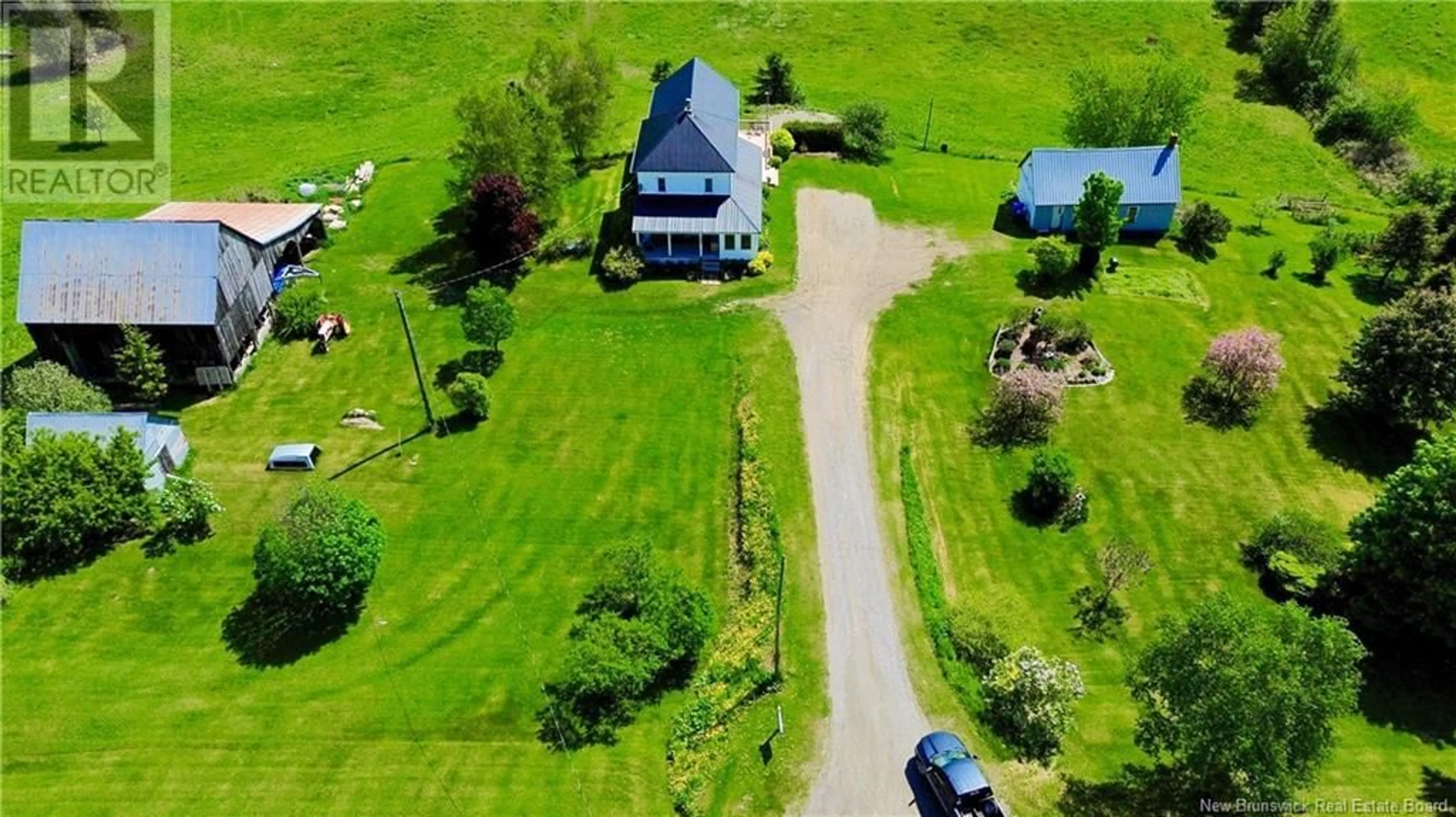 A pic from outside/outdoor area/front of a property/back of a property/a pic from drone, building for 2500 560 ROUTE, Williamstown New Brunswick E7K1S8