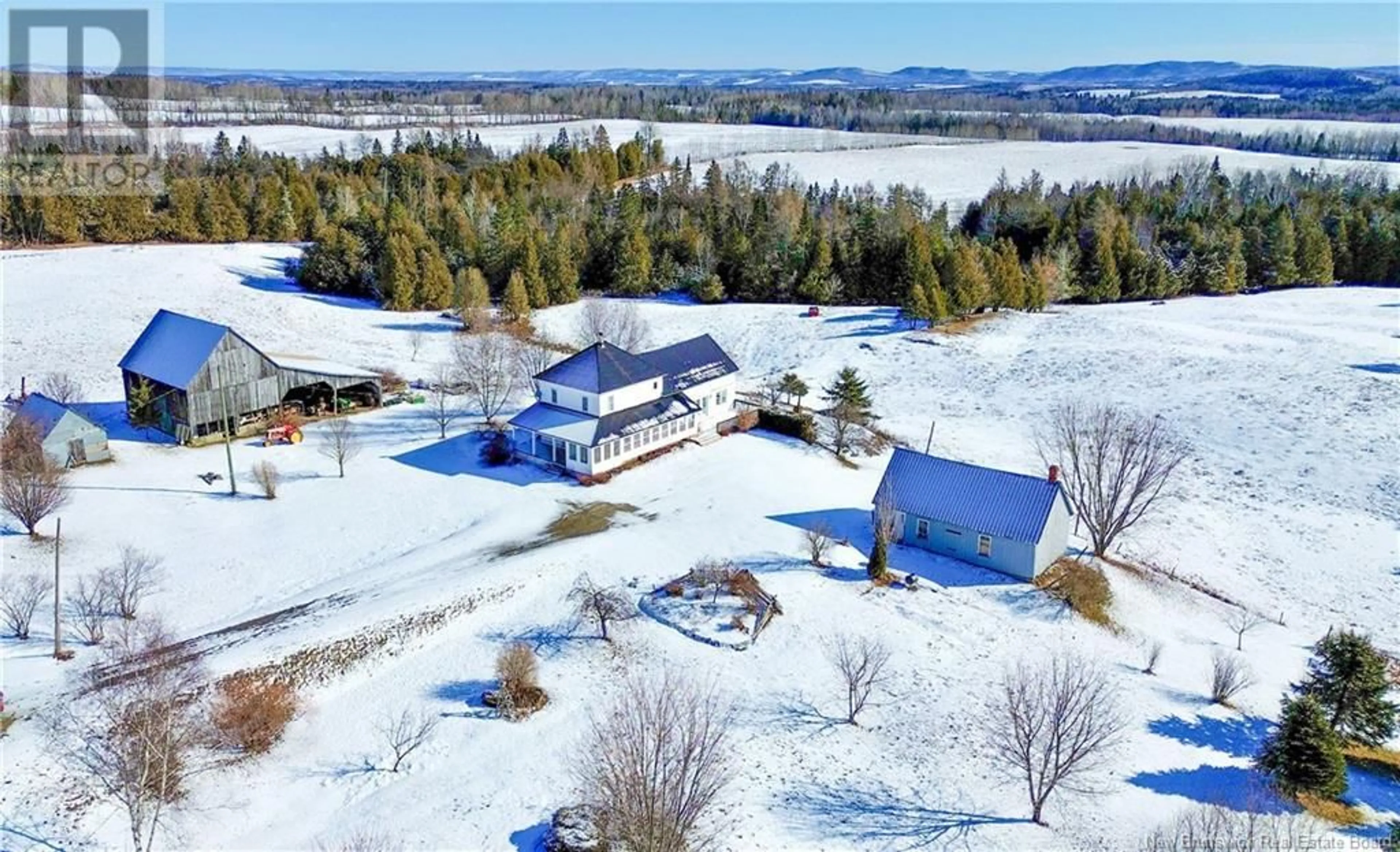 A pic from outside/outdoor area/front of a property/back of a property/a pic from drone, water/lake/river/ocean view for 2500 560 Route, Williamstown New Brunswick E7K1S8