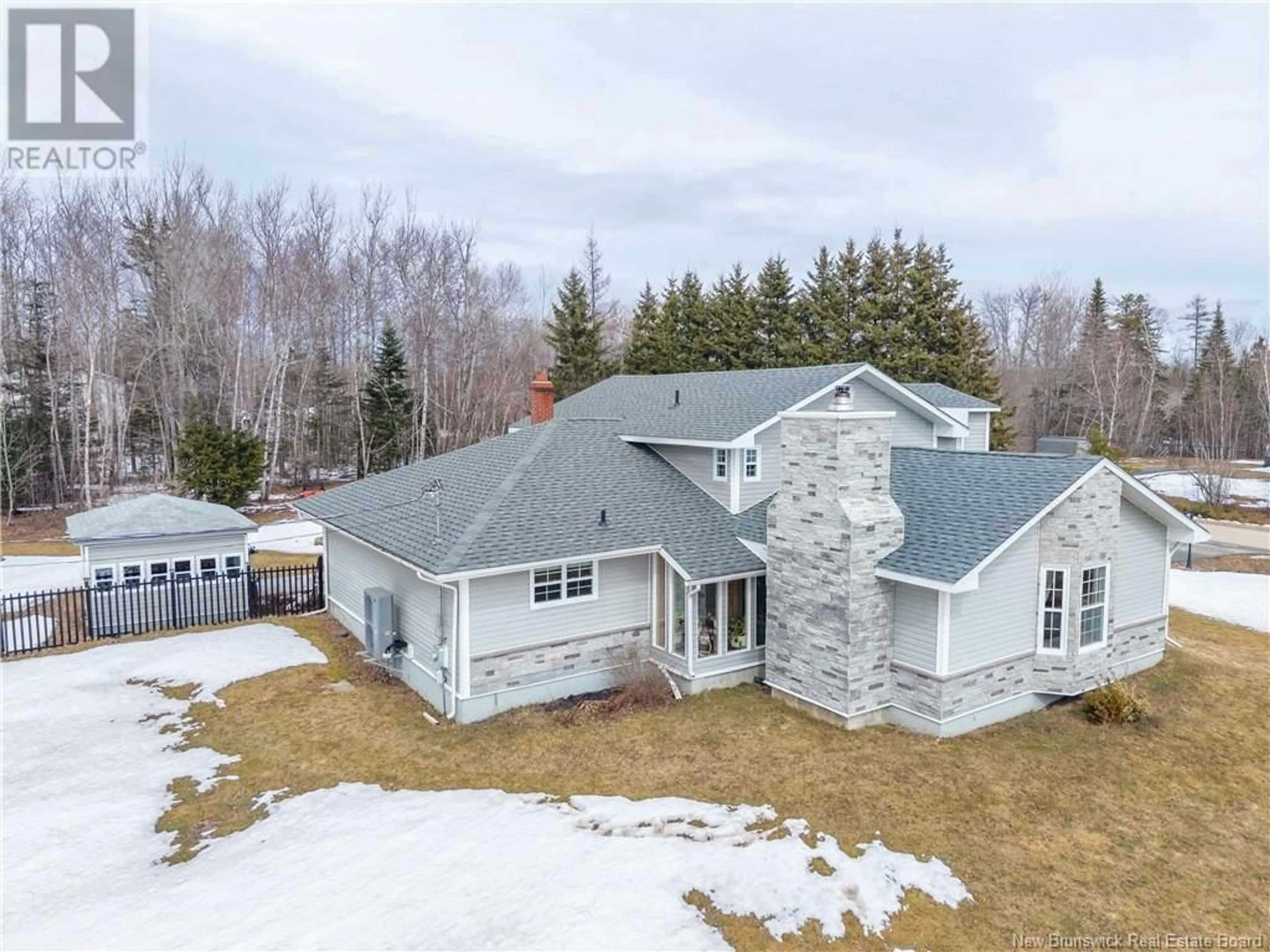 A pic from outside/outdoor area/front of a property/back of a property/a pic from drone, unknown for 1 Silverwood Drive, Miramichi New Brunswick E1V5Z1