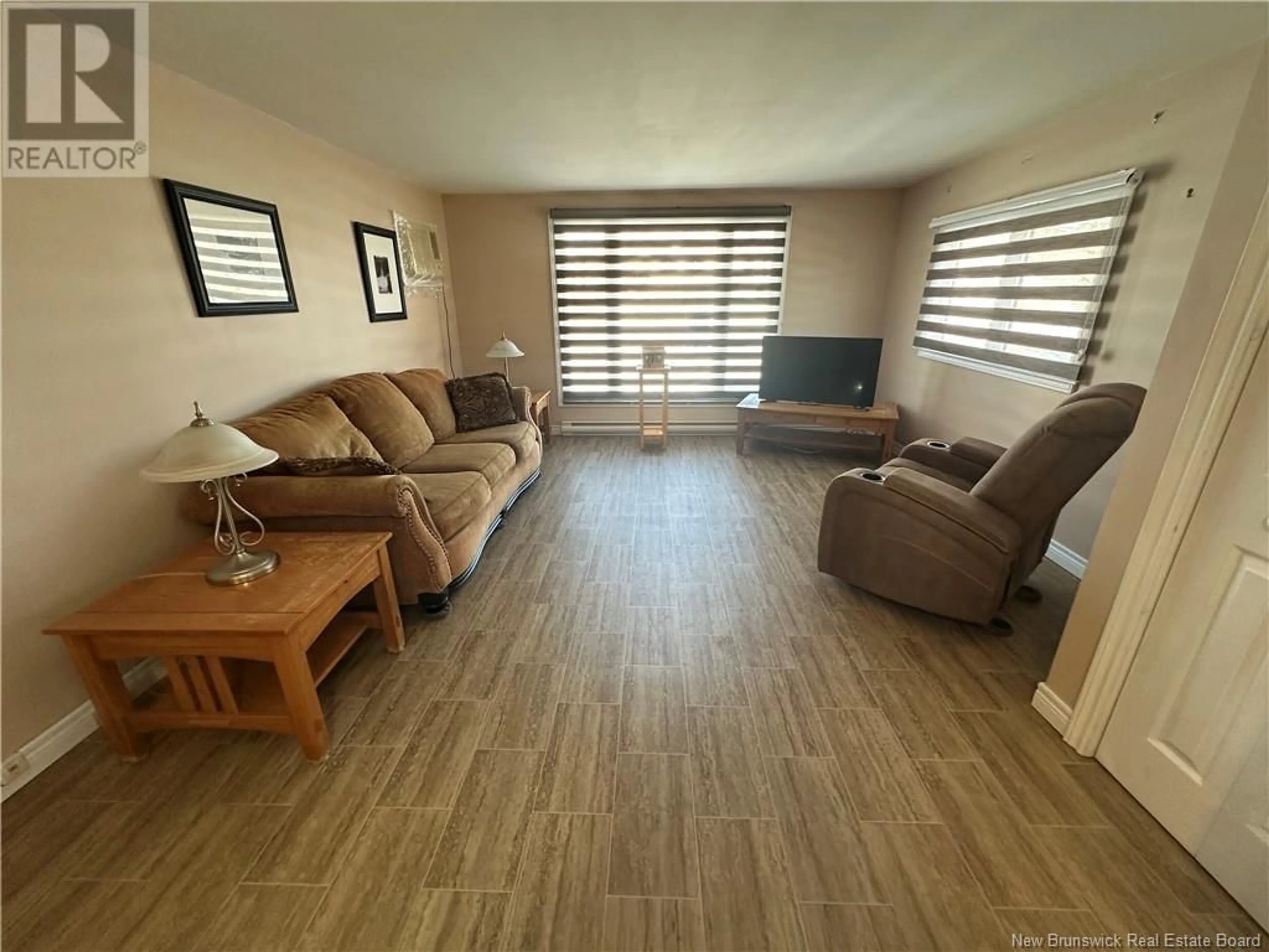 Living room with furniture, wood/laminate floor for 190 LAKESIDE AVENUE, Bathurst New Brunswick E2A2S7